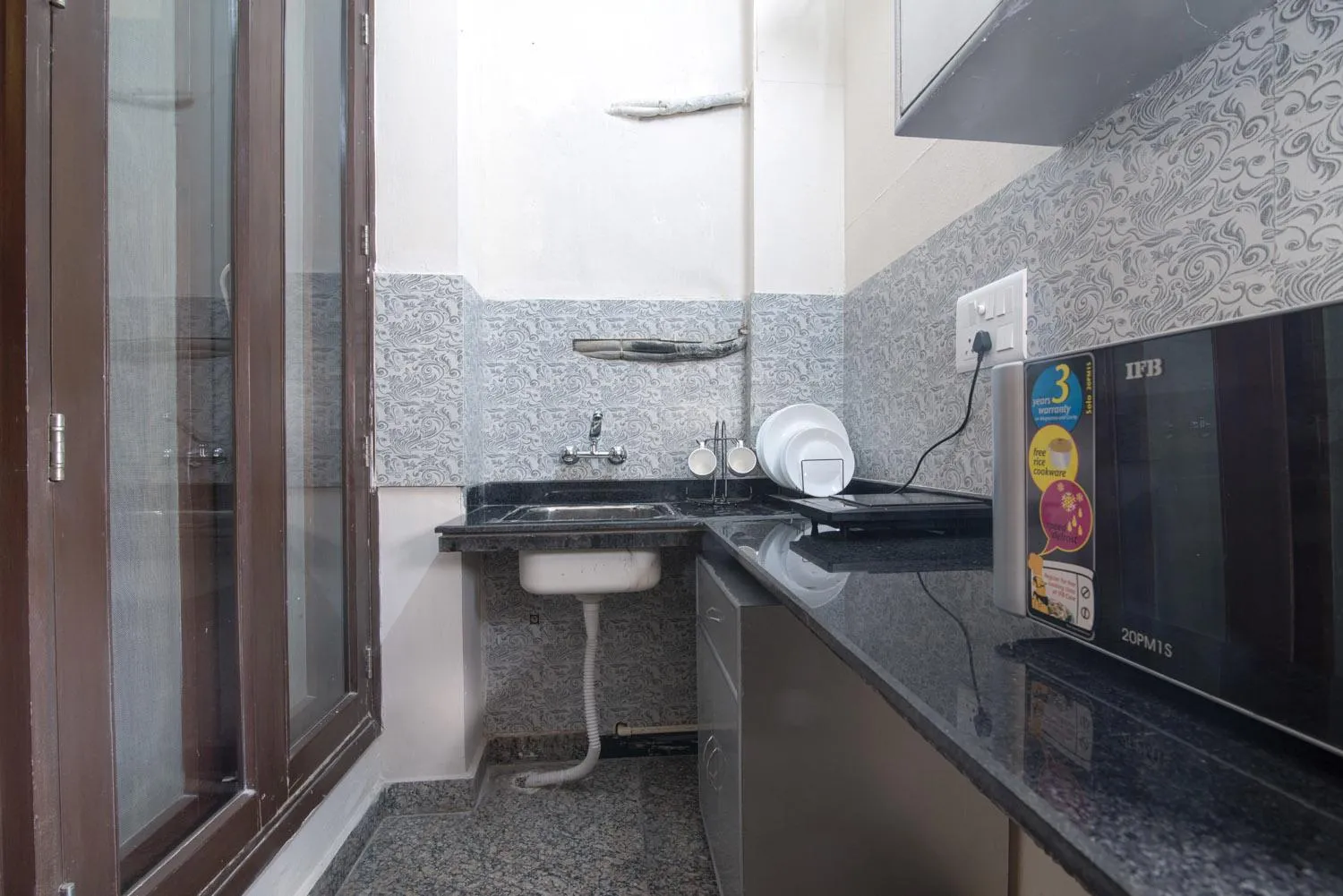 Kitchen or kitchenette in Perch Arbor Suites