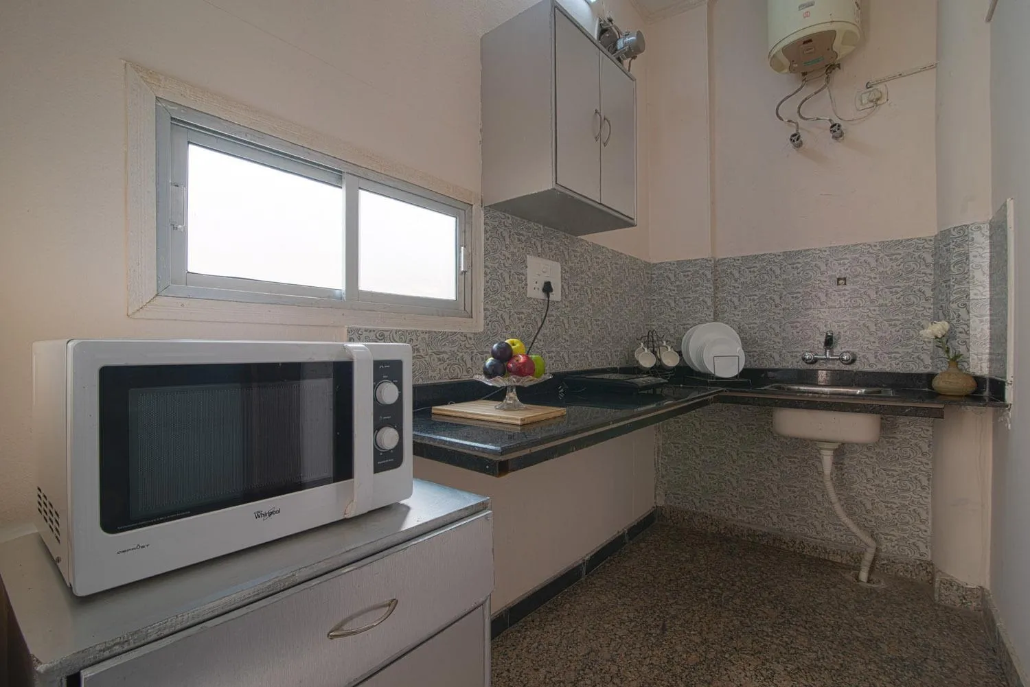 Kitchen or kitchenette in Perch Arbor Suites