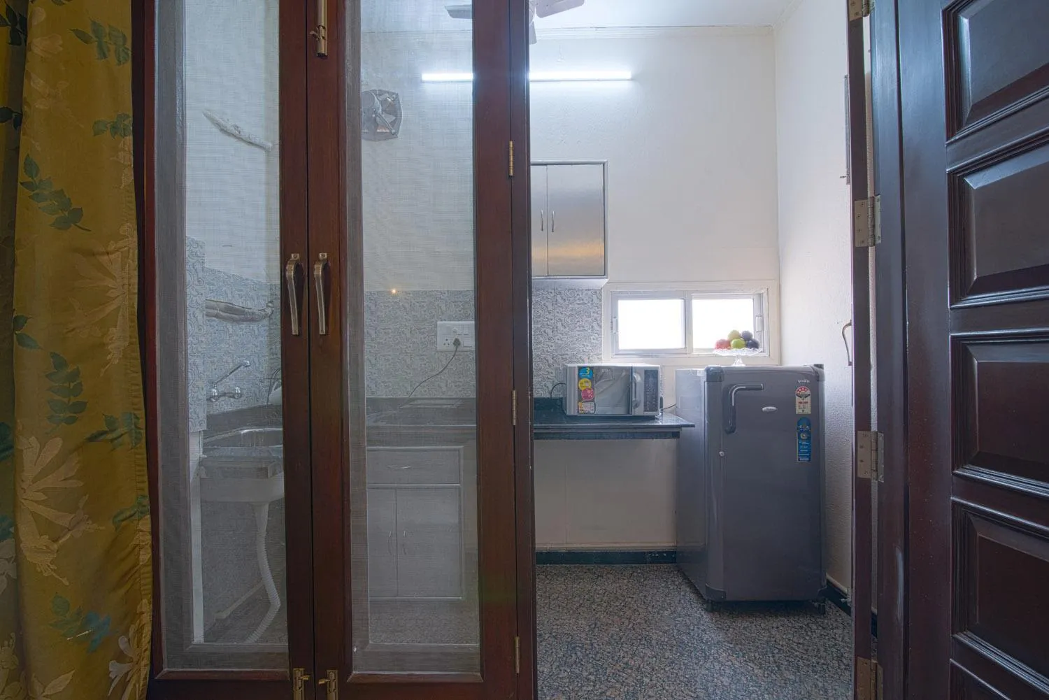 Kitchen or kitchenette in Perch Arbor Suites