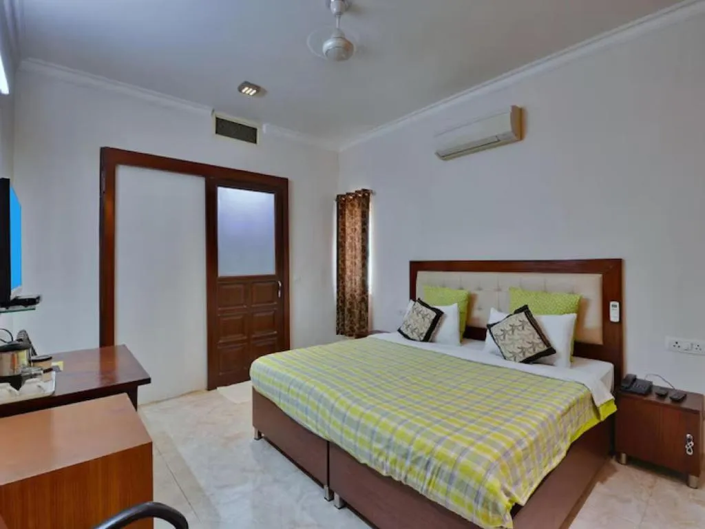 Bed in Perch Arbor Suites