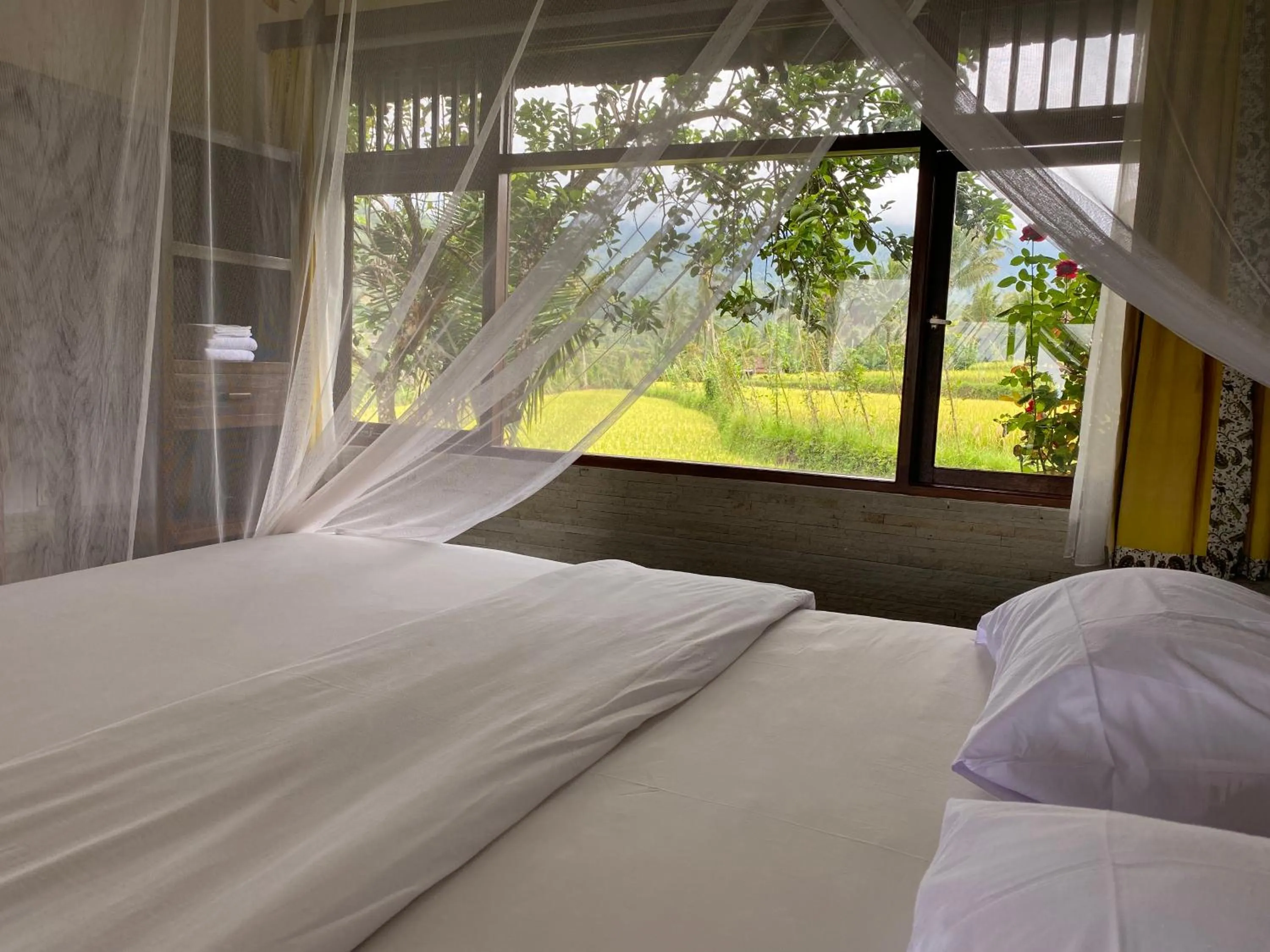 Bed in Lesong Hotel and Restaurant
