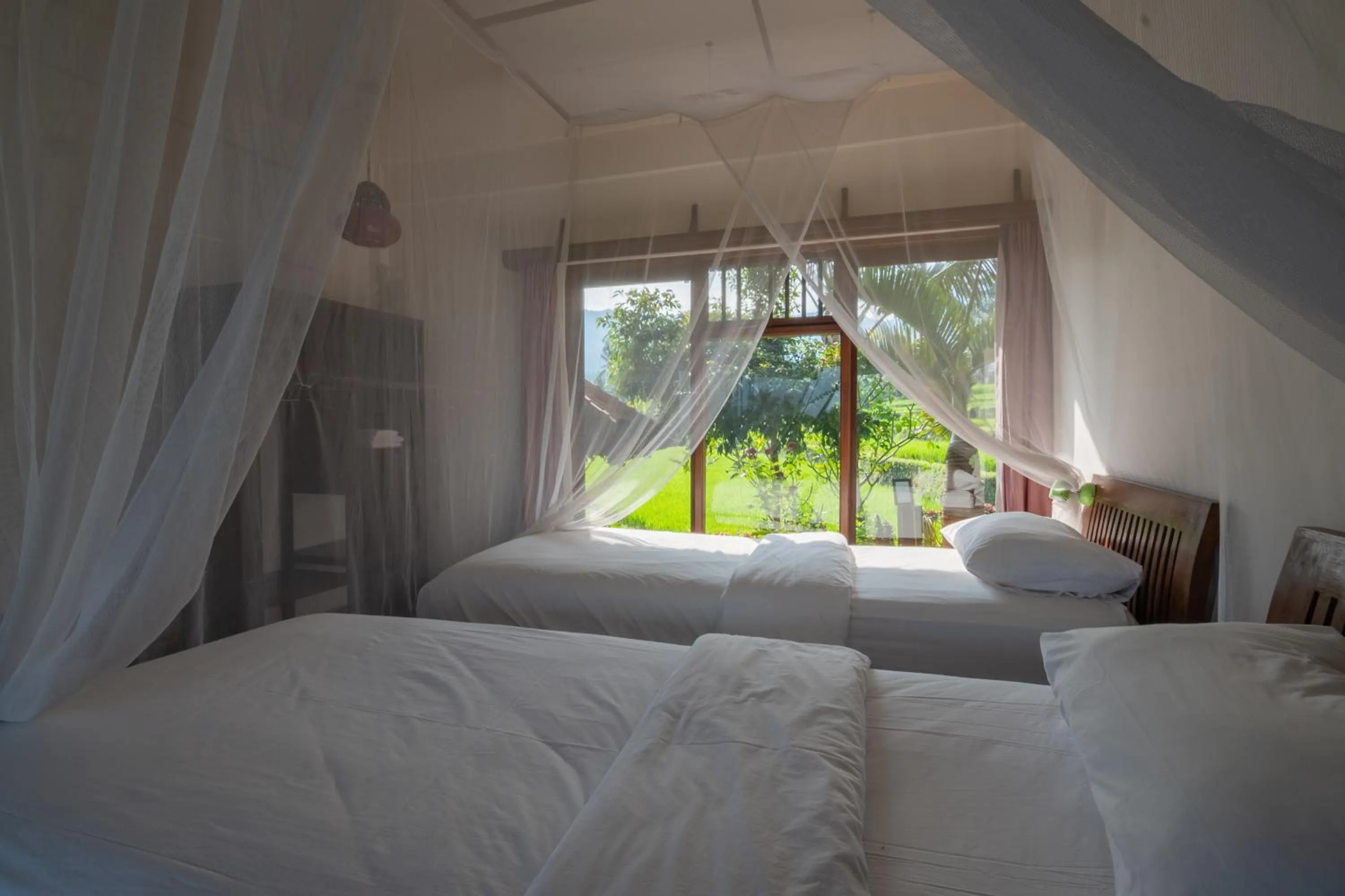 Bed in Lesong Hotel and Restaurant