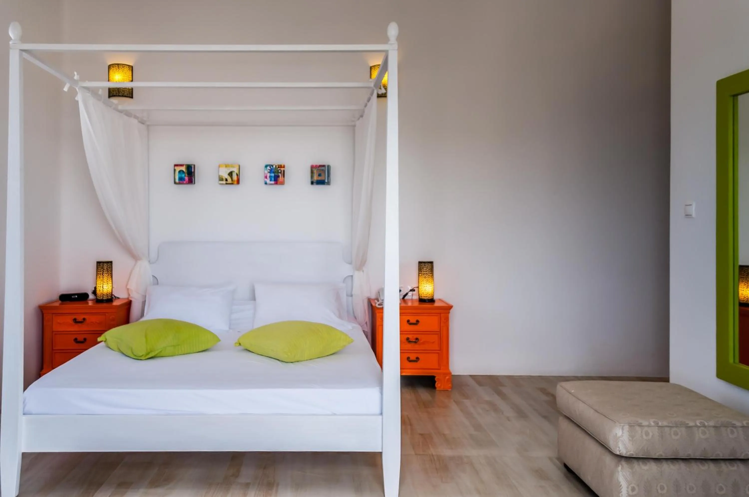 Bed in Eiriana Luxury Suites