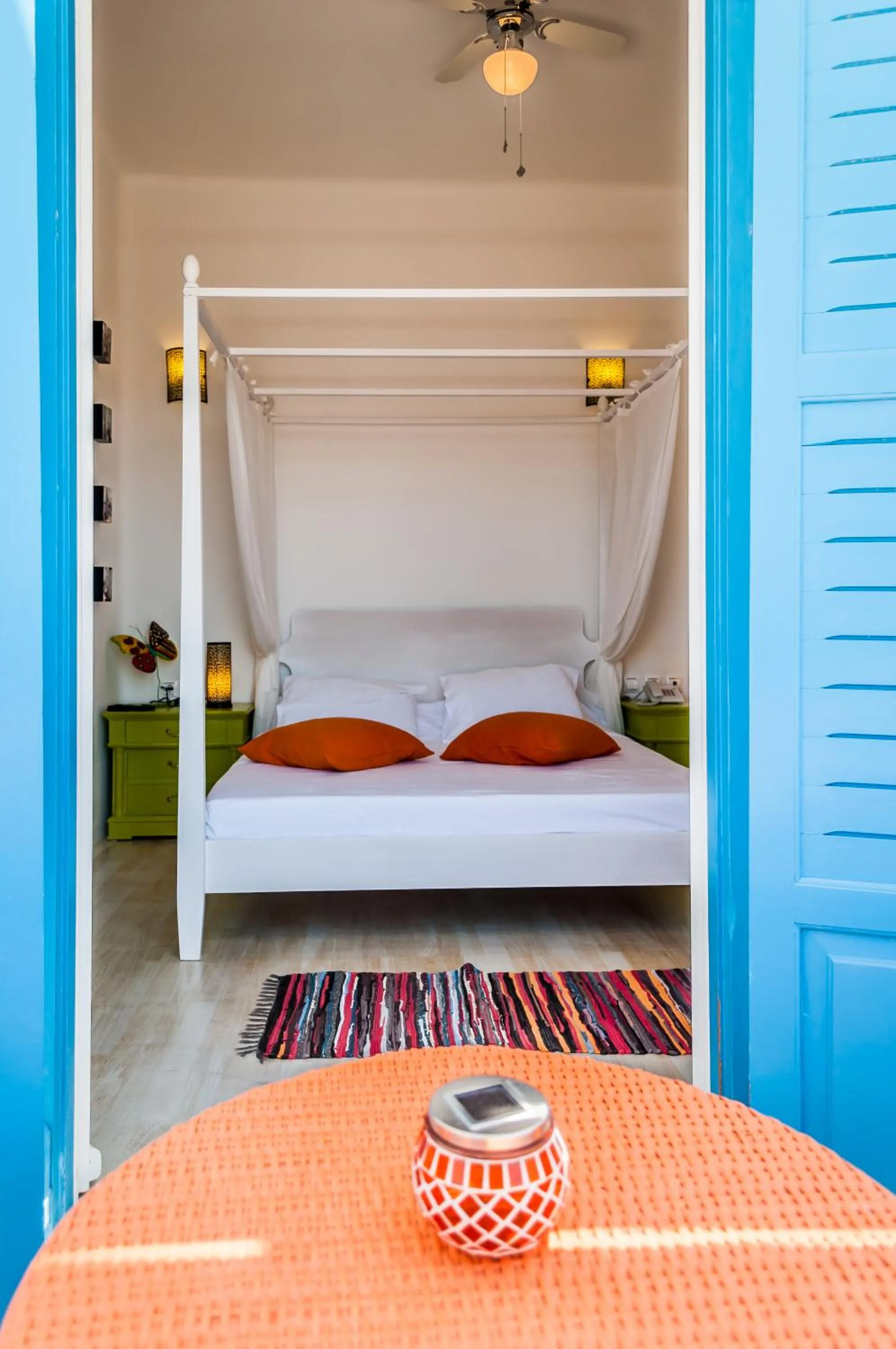 Bed in Eiriana Luxury Suites