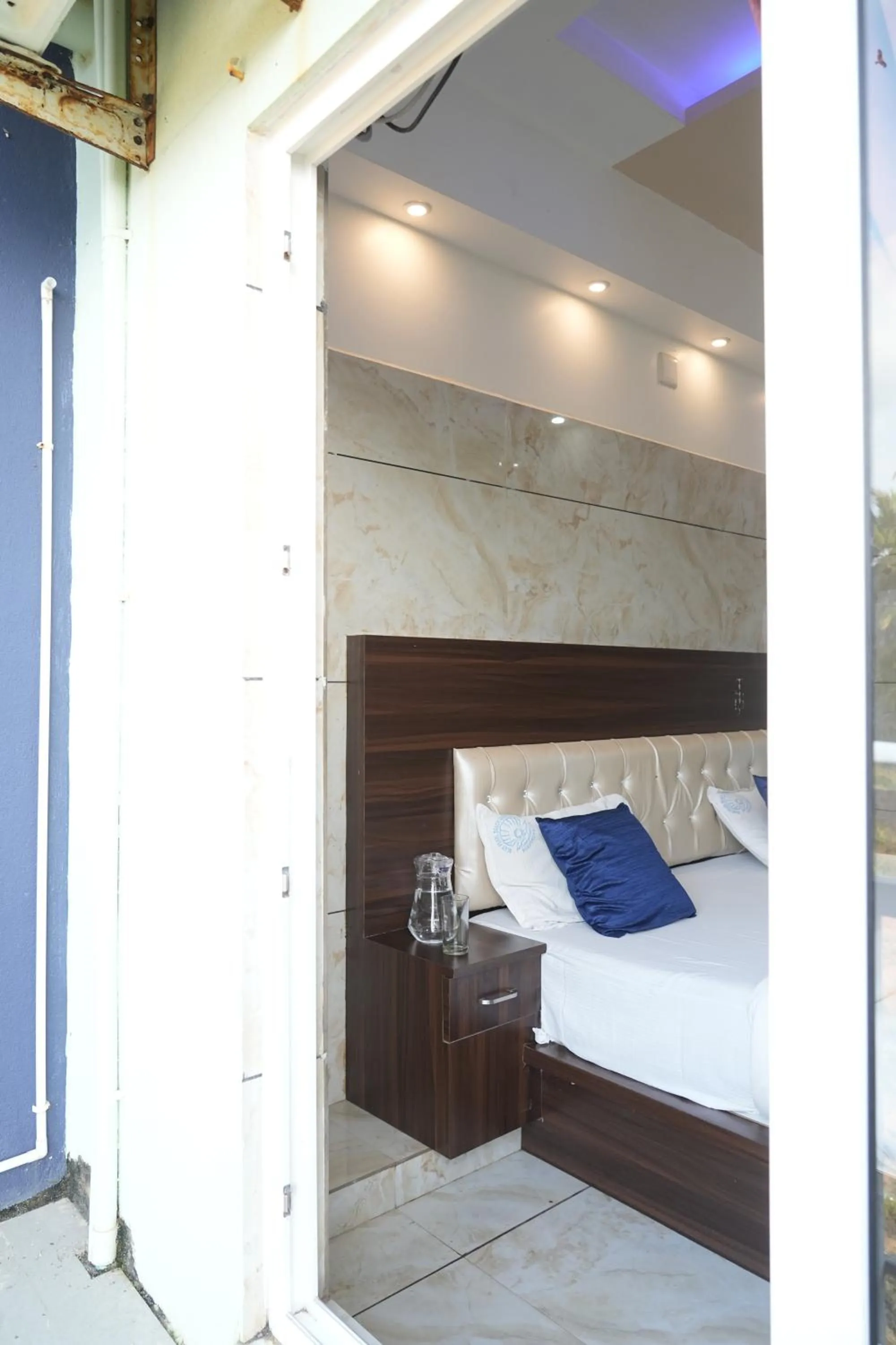 Bed in Blue Pearl Beach Guest House