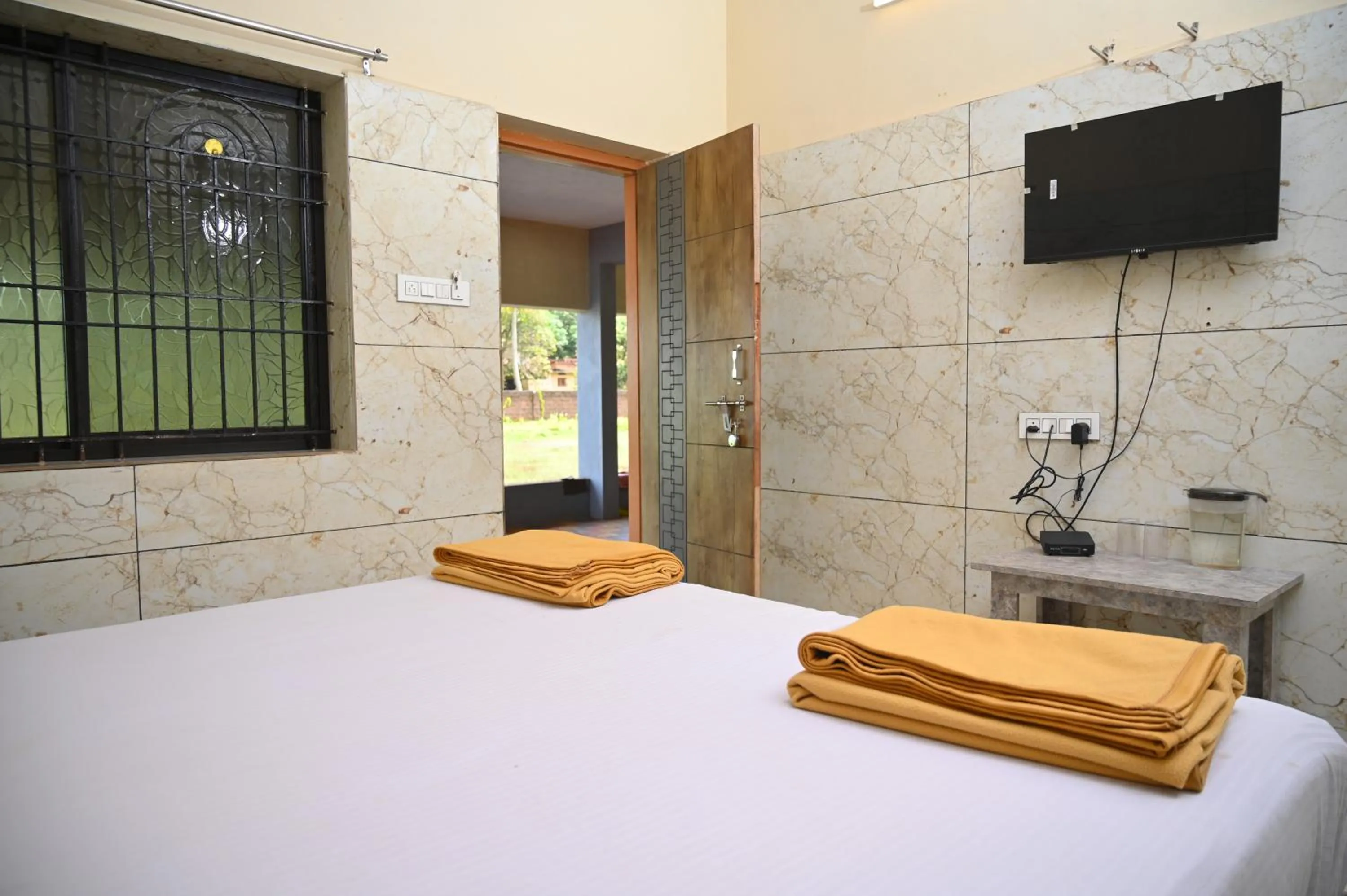 Bed in Blue Pearl Beach Guest House