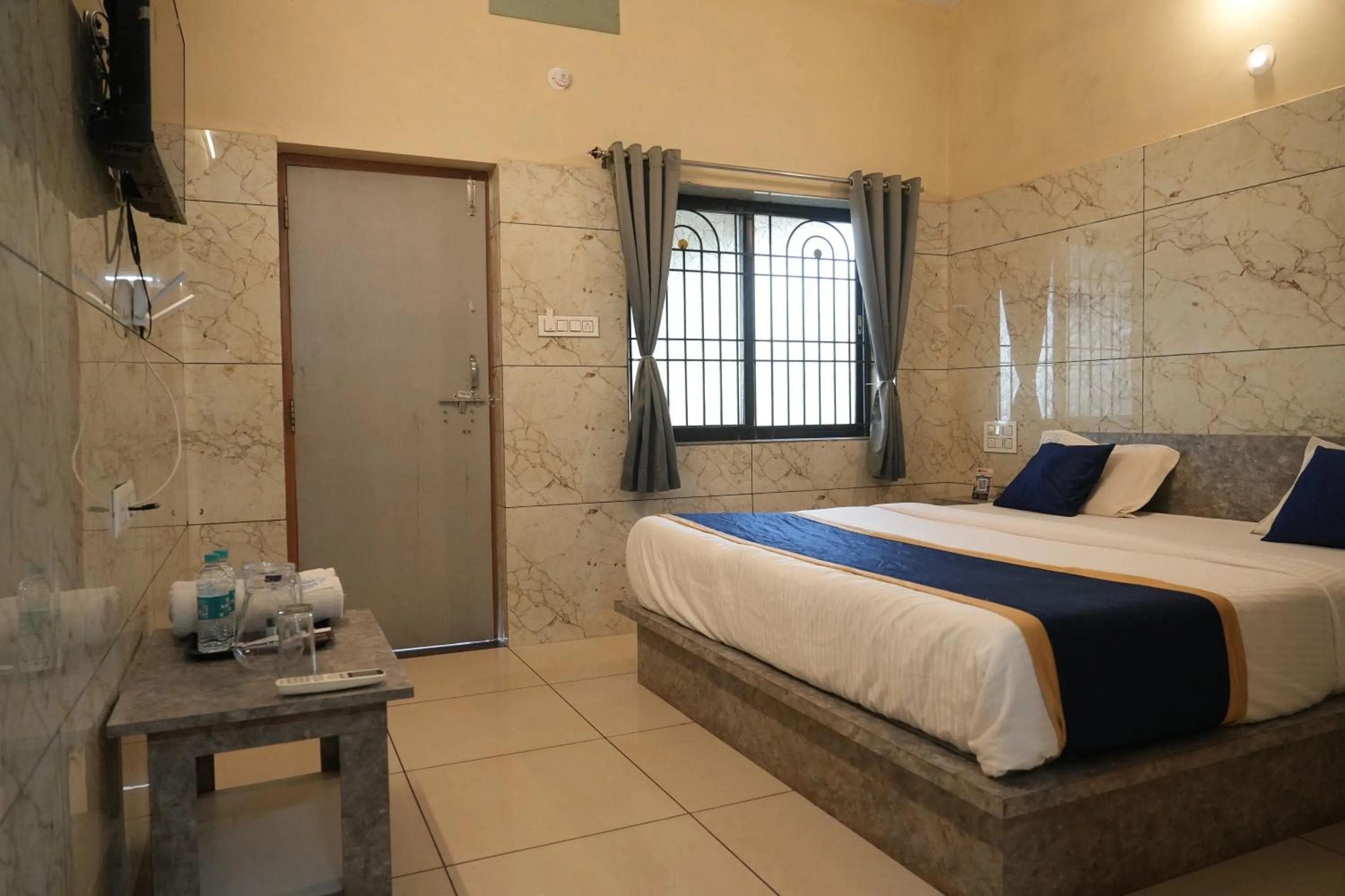 Bed in Blue Pearl Beach Guest House