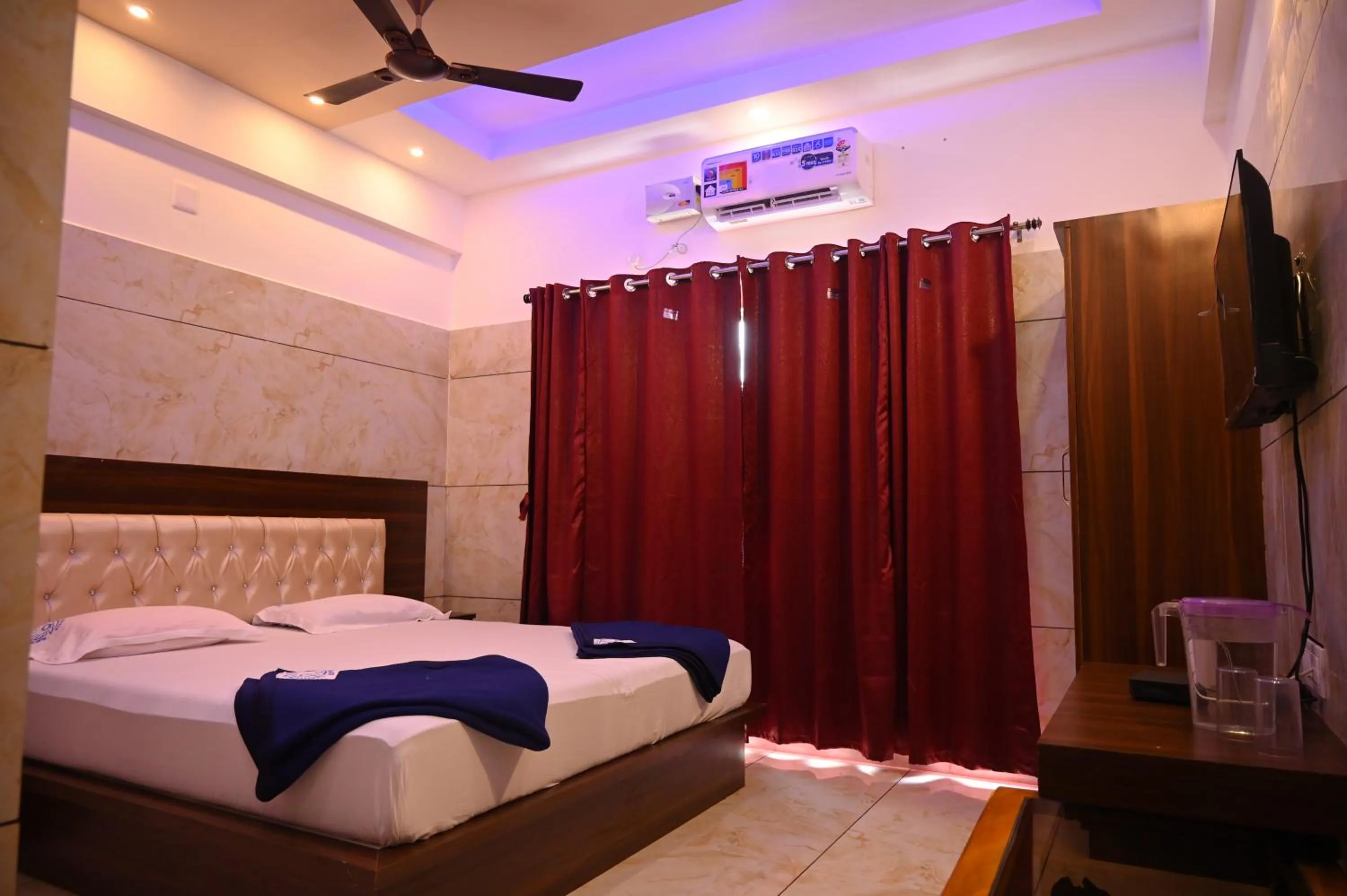 Bed in Blue Pearl Beach Guest House