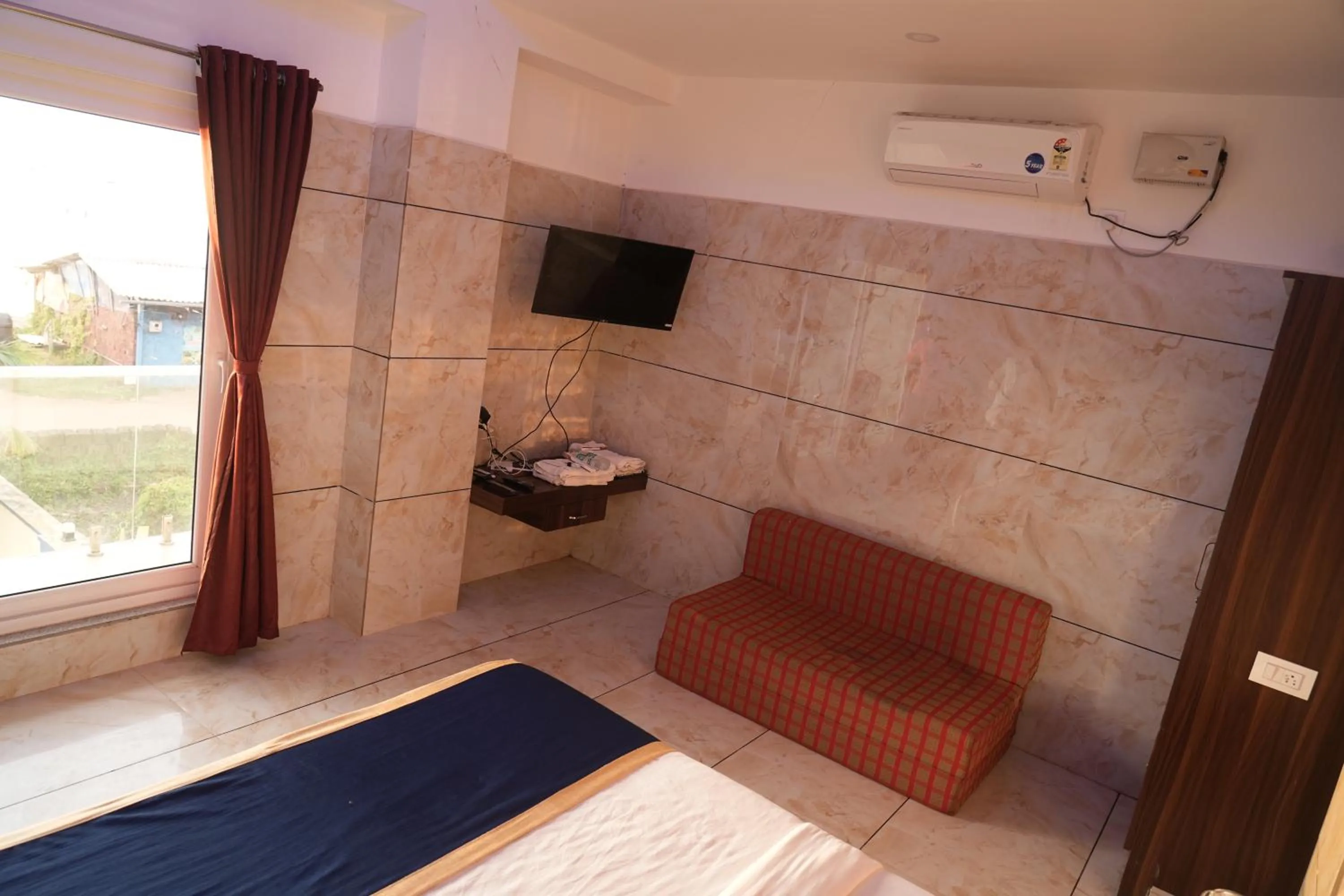 Bed in Blue Pearl Beach Guest House