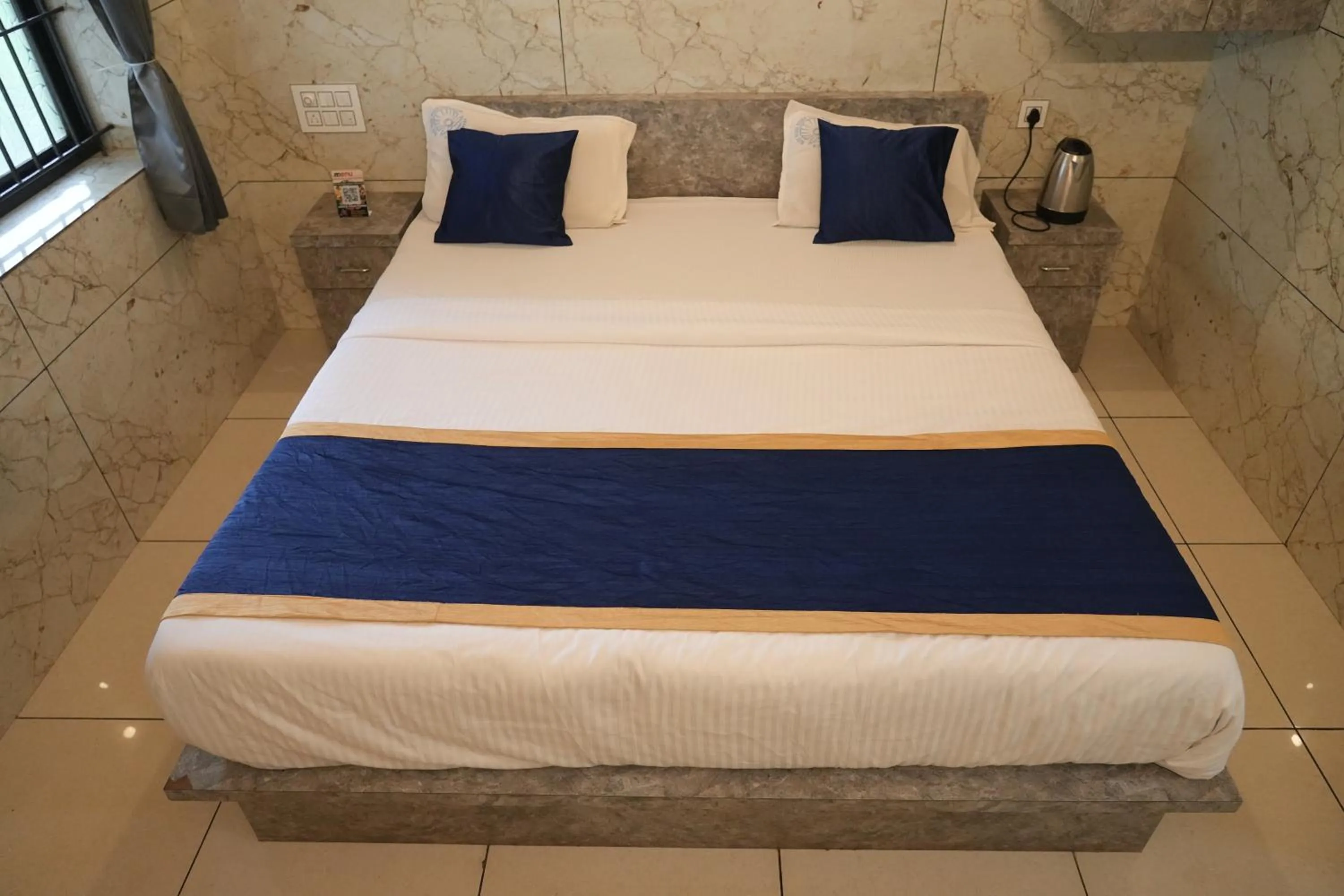 Bed in Blue Pearl Beach Guest House