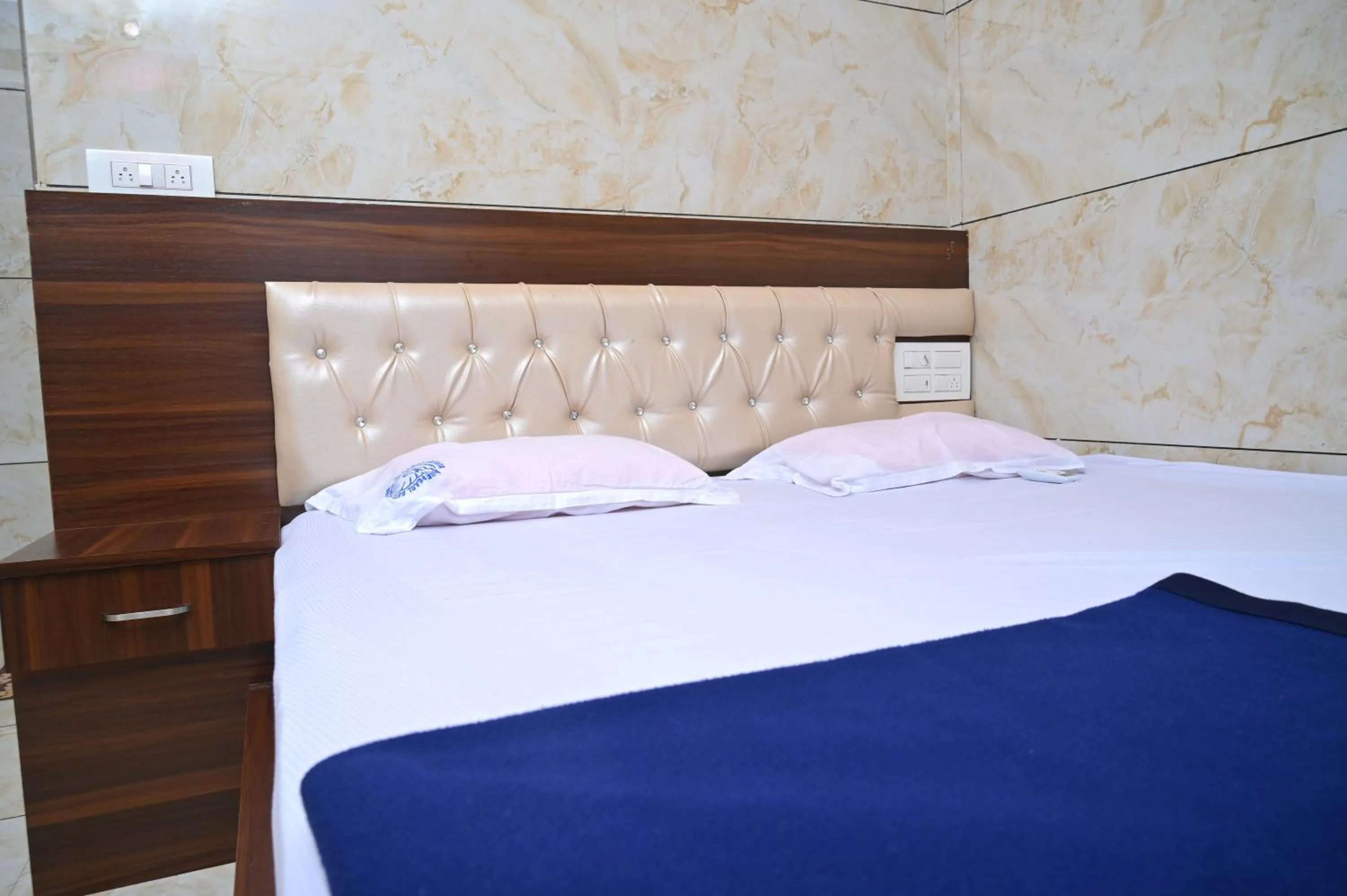 Bed in Blue Pearl Beach Guest House