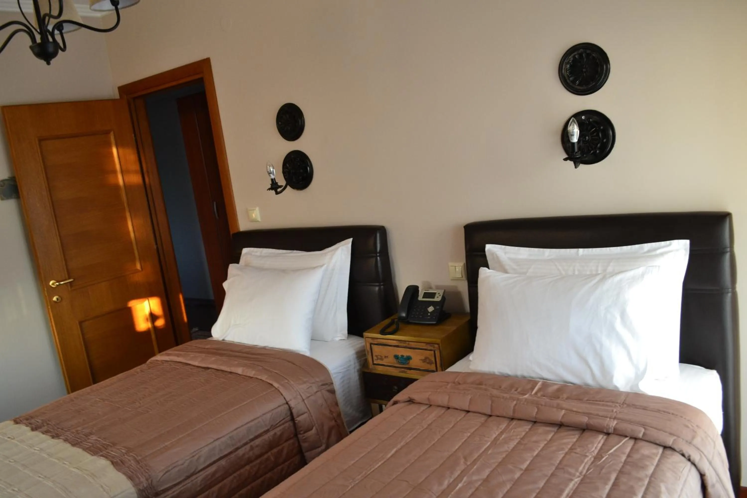 Decorative detail, Bed in Evmorfes Villas