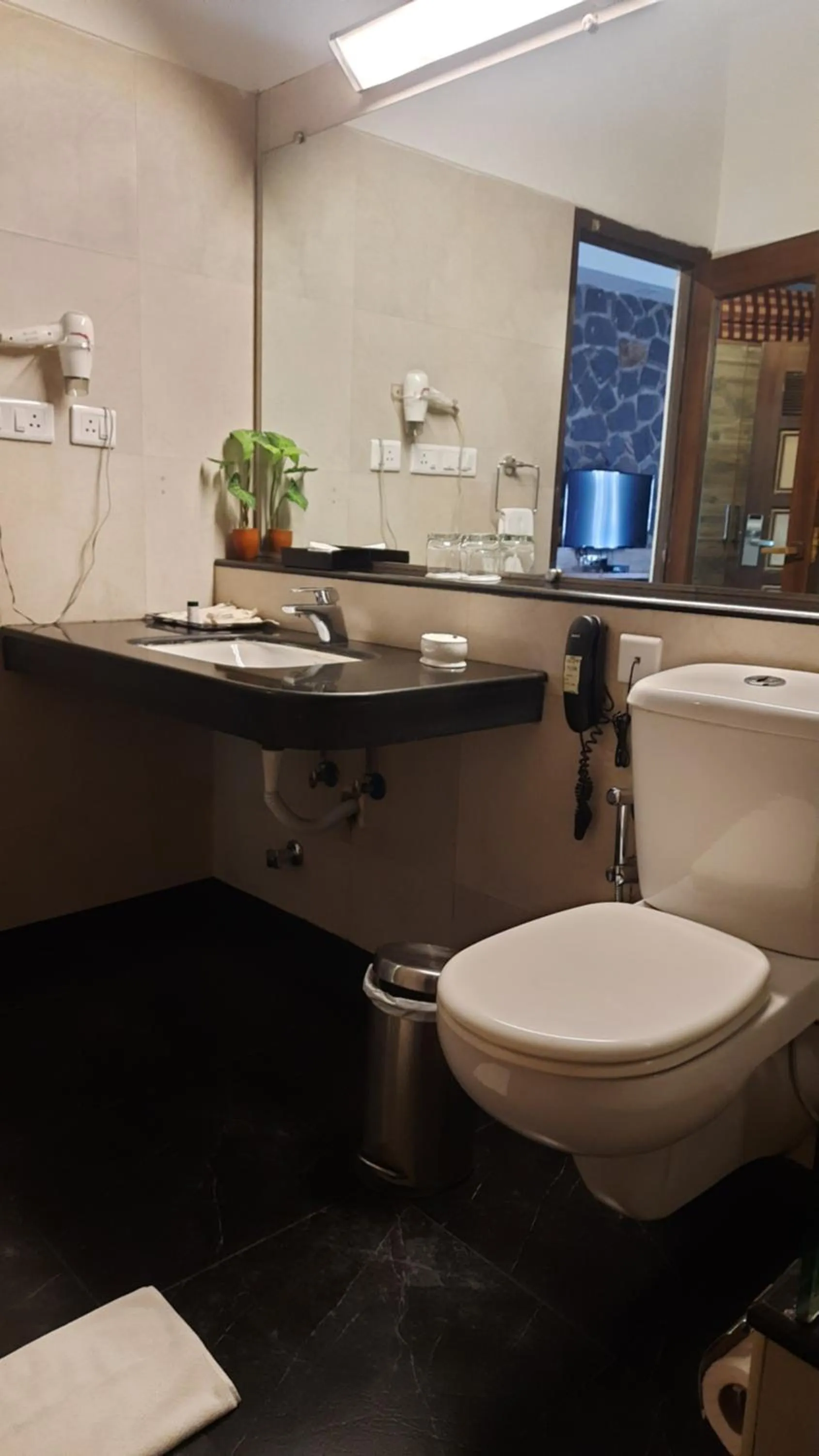 Bathroom in GReaT Trails Yercaud by GRT Hotels