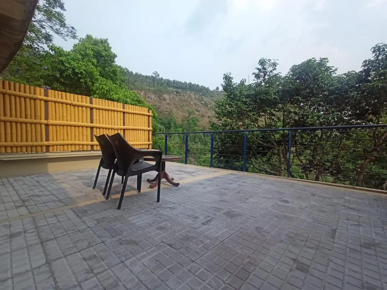 Seating area in GReaT Trails Yercaud by GRT Hotels