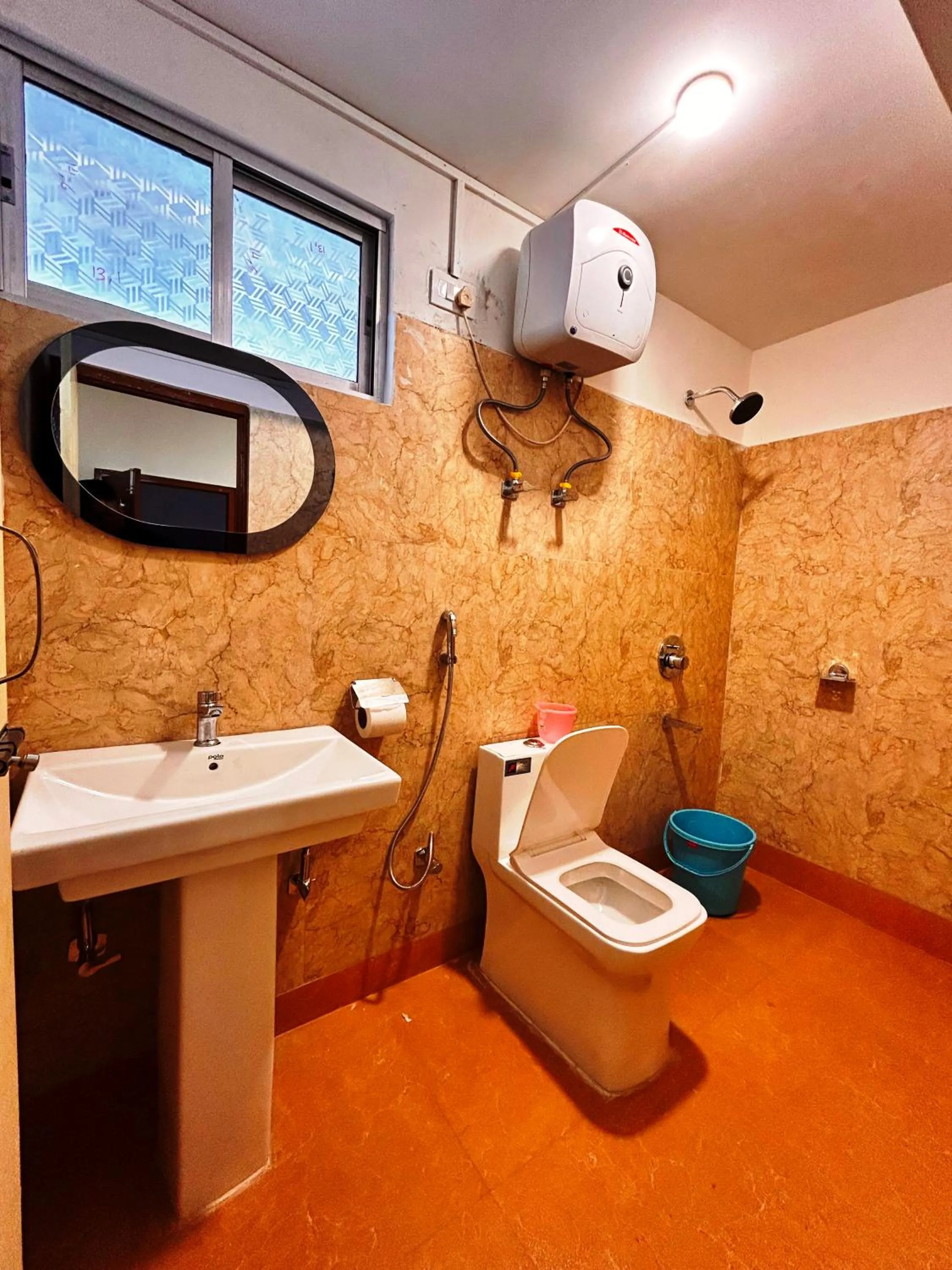 Bathroom in DISHA SILVER PEAK Hotel