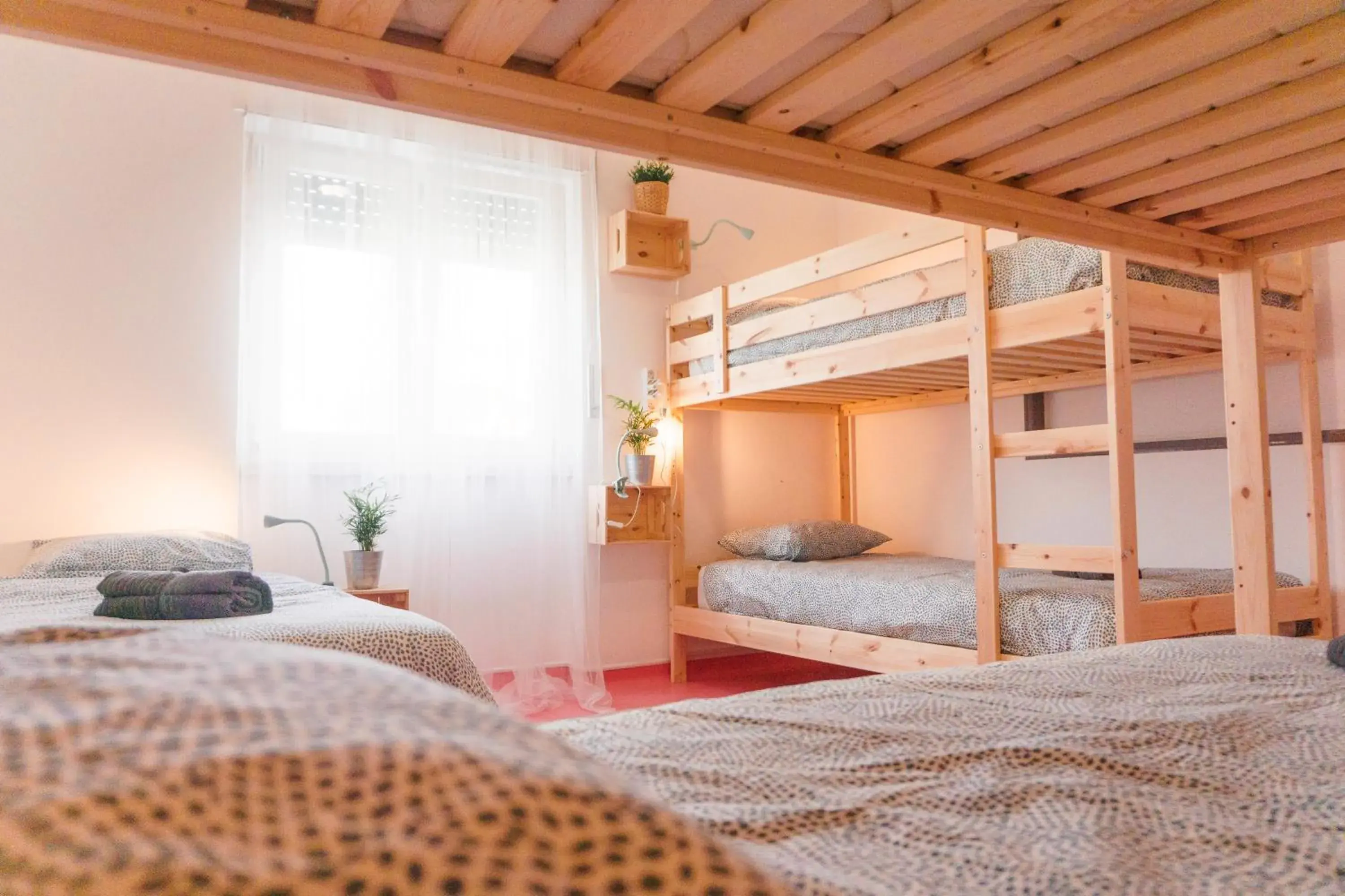 Bed in mixed Quadruple room with shared bathroom in Hospedium Hostel República Surf House Bed in mixed Quadruple room with shared bathroom in Hospedium Hostel República Surf House