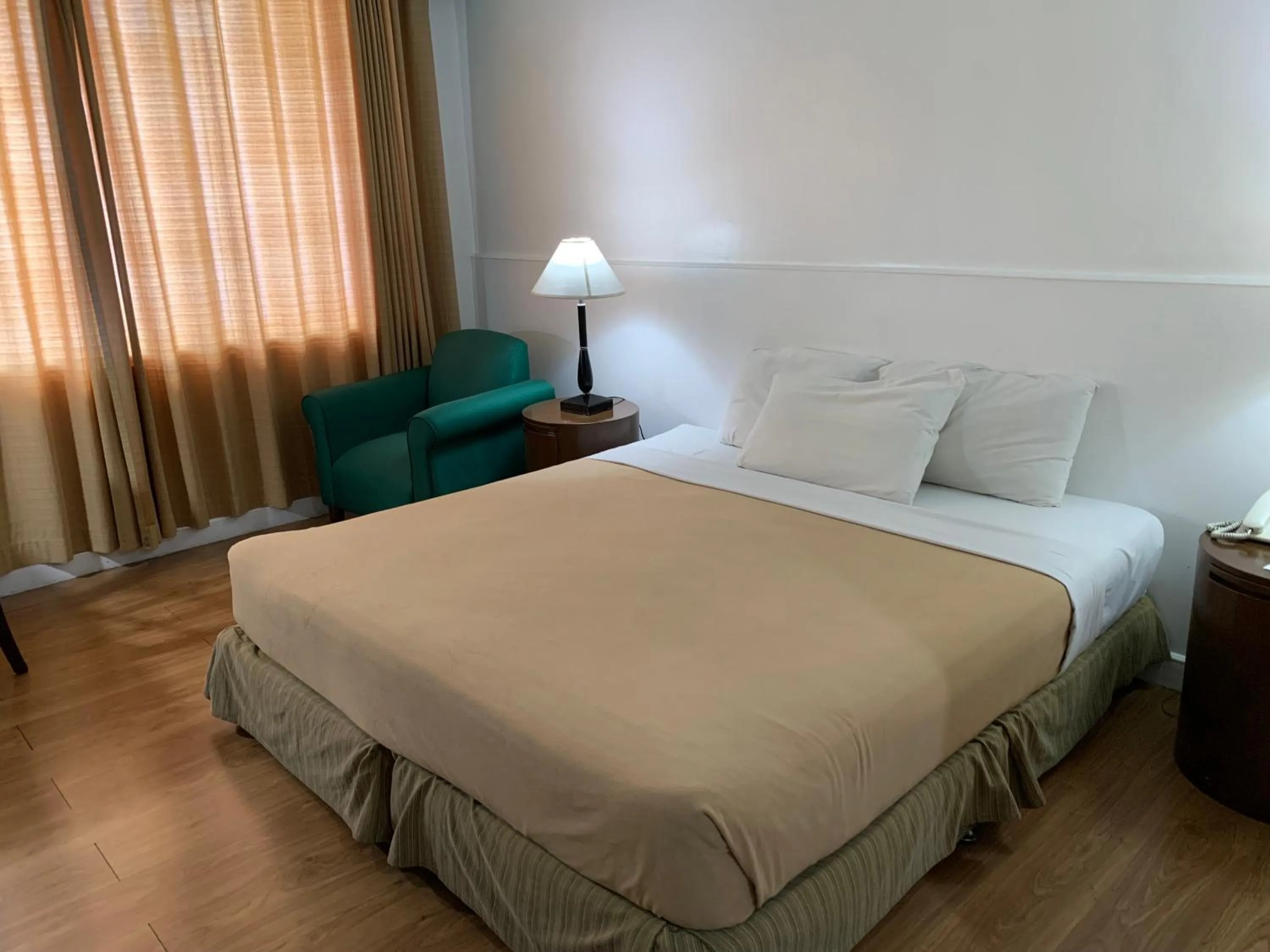 Bed in Pearl Manila Hotel