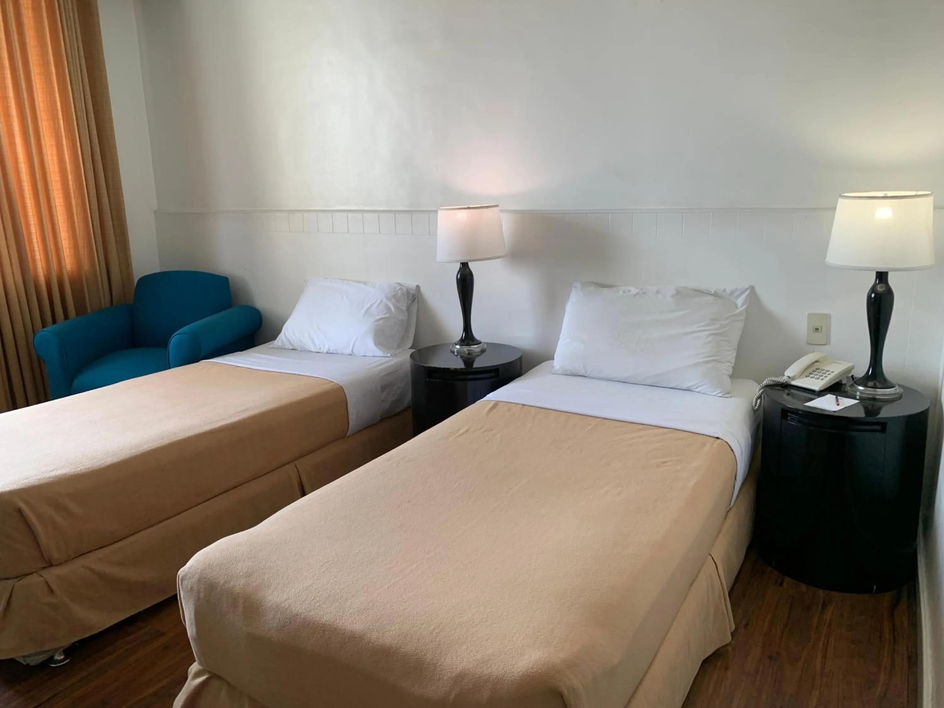 Bed in Pearl Manila Hotel