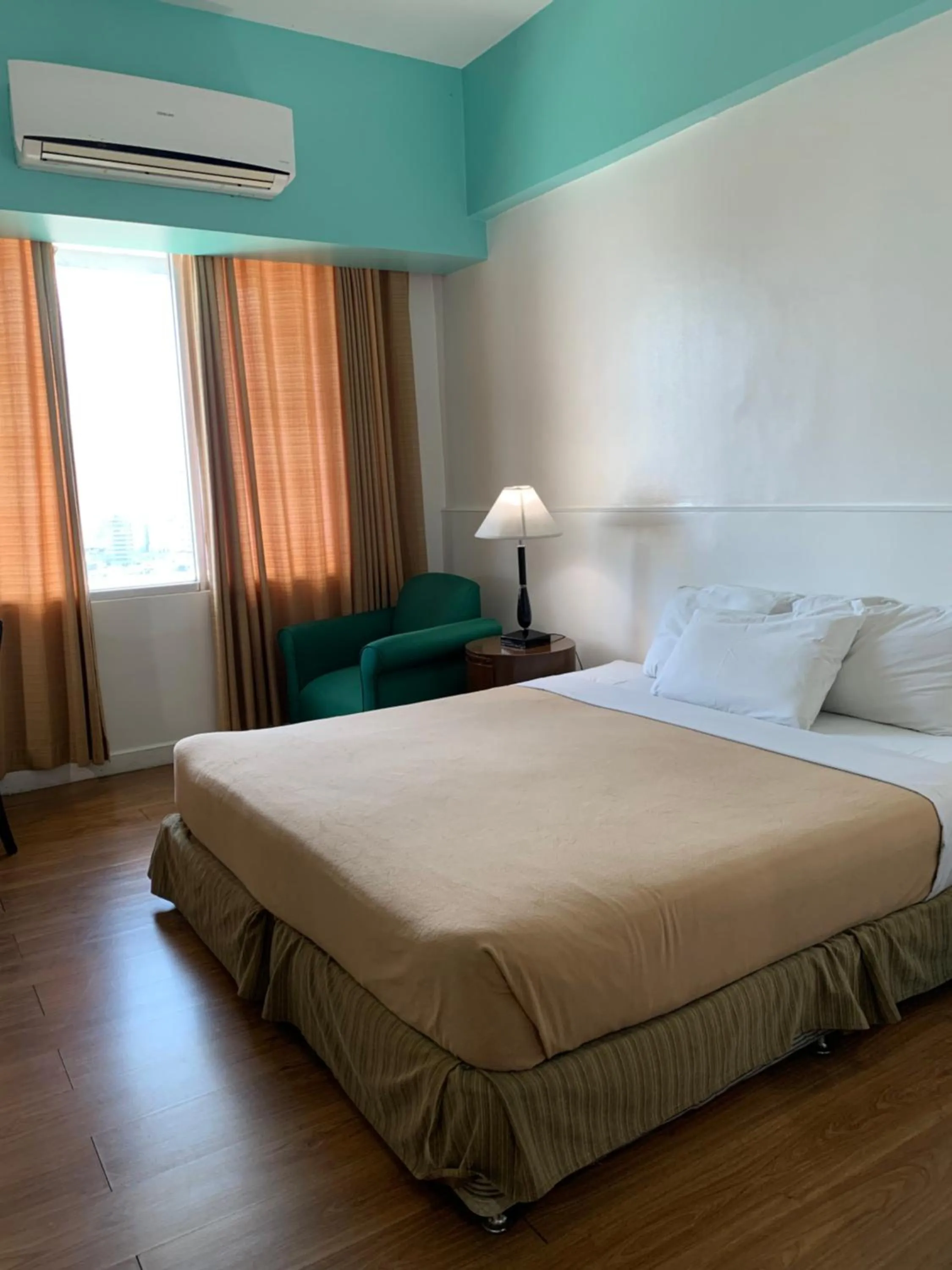 Bed in Pearl Manila Hotel