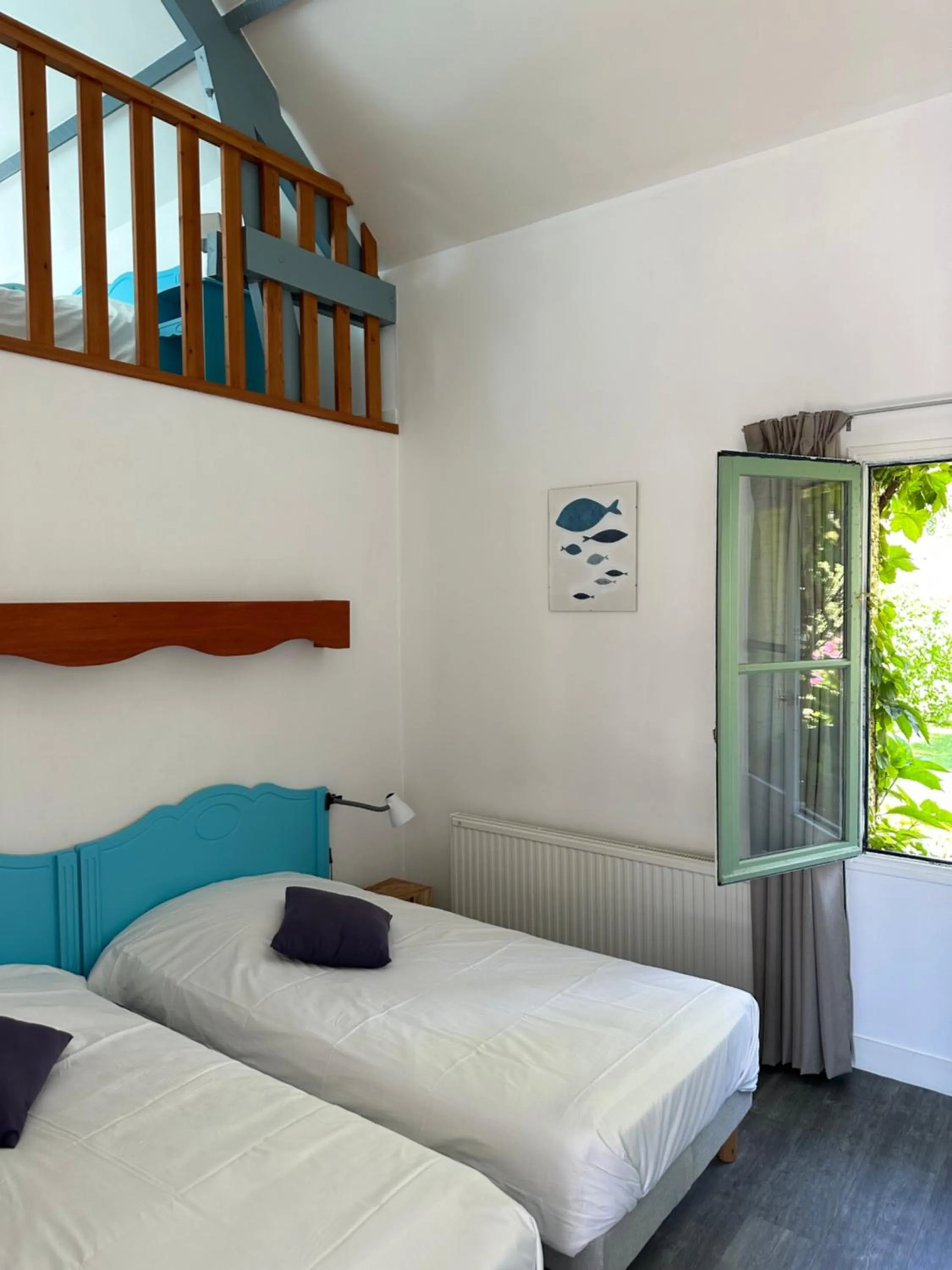 Bed in Logis Hôtel La Demeure du Perron