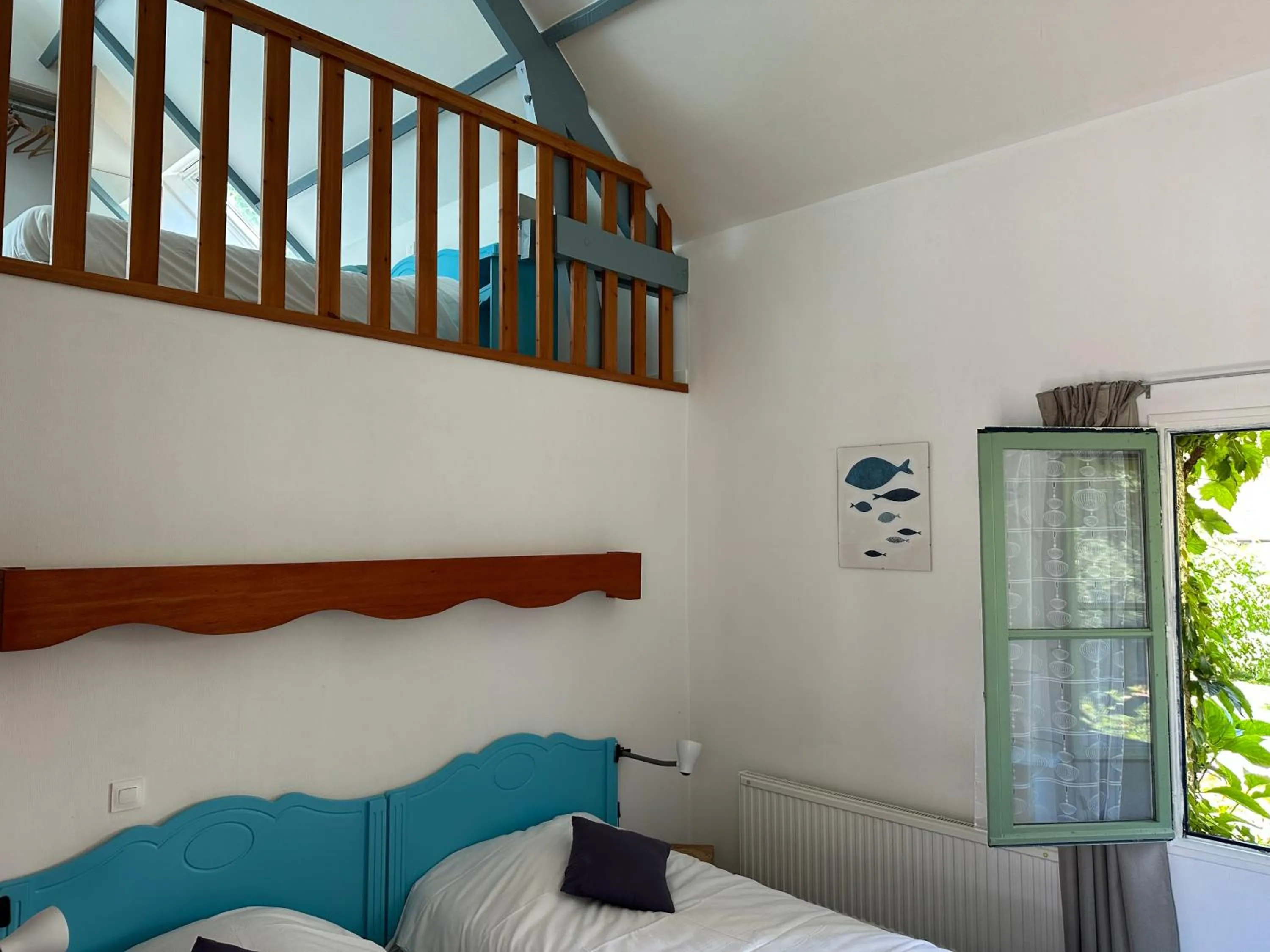 Bed in Logis Hôtel La Demeure du Perron