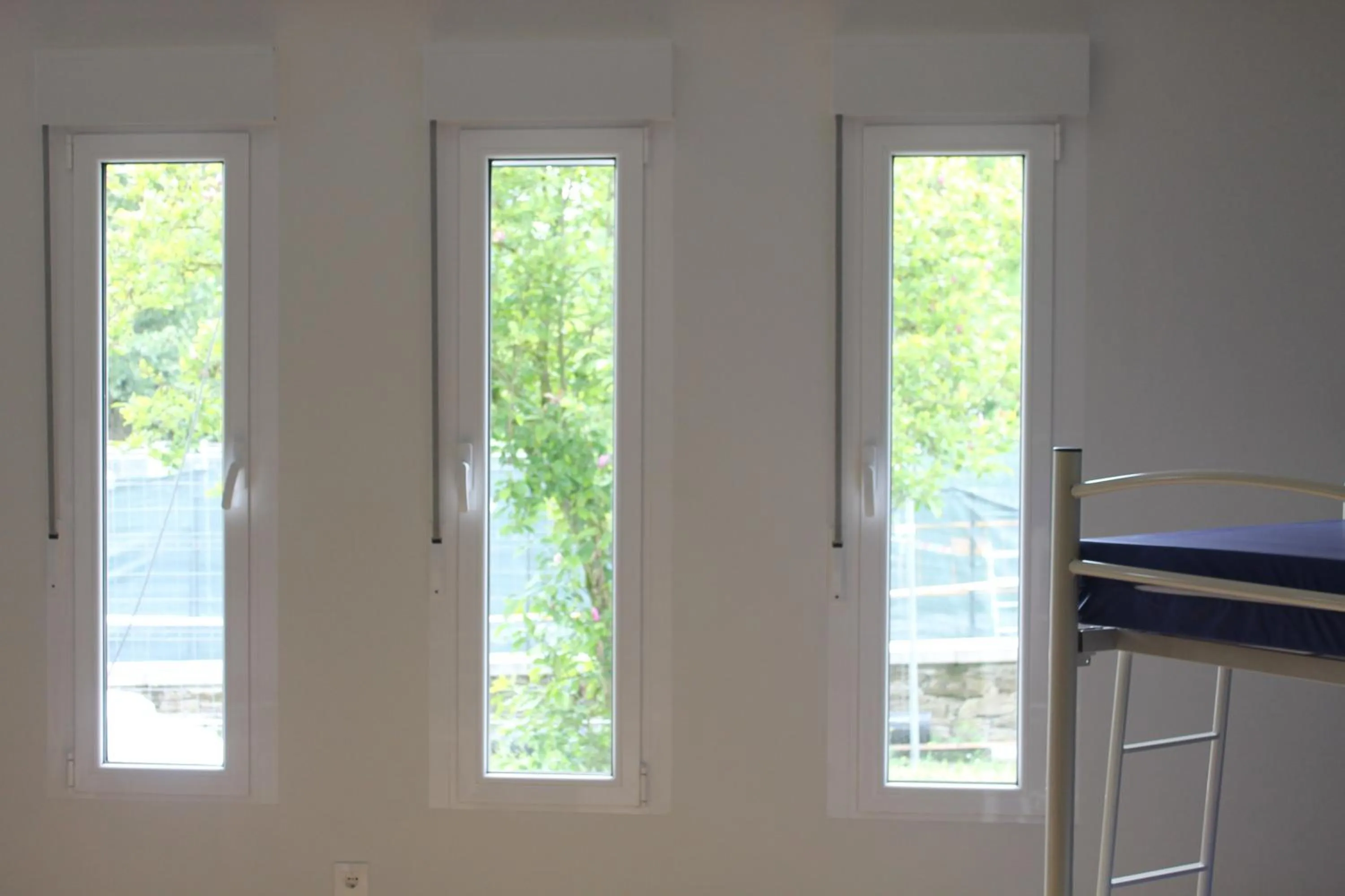 Bedroom in Pensión-Albergue Puente Ribeira