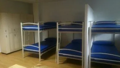 bunk bed, Bed in Pensión-Albergue Puente Ribeira