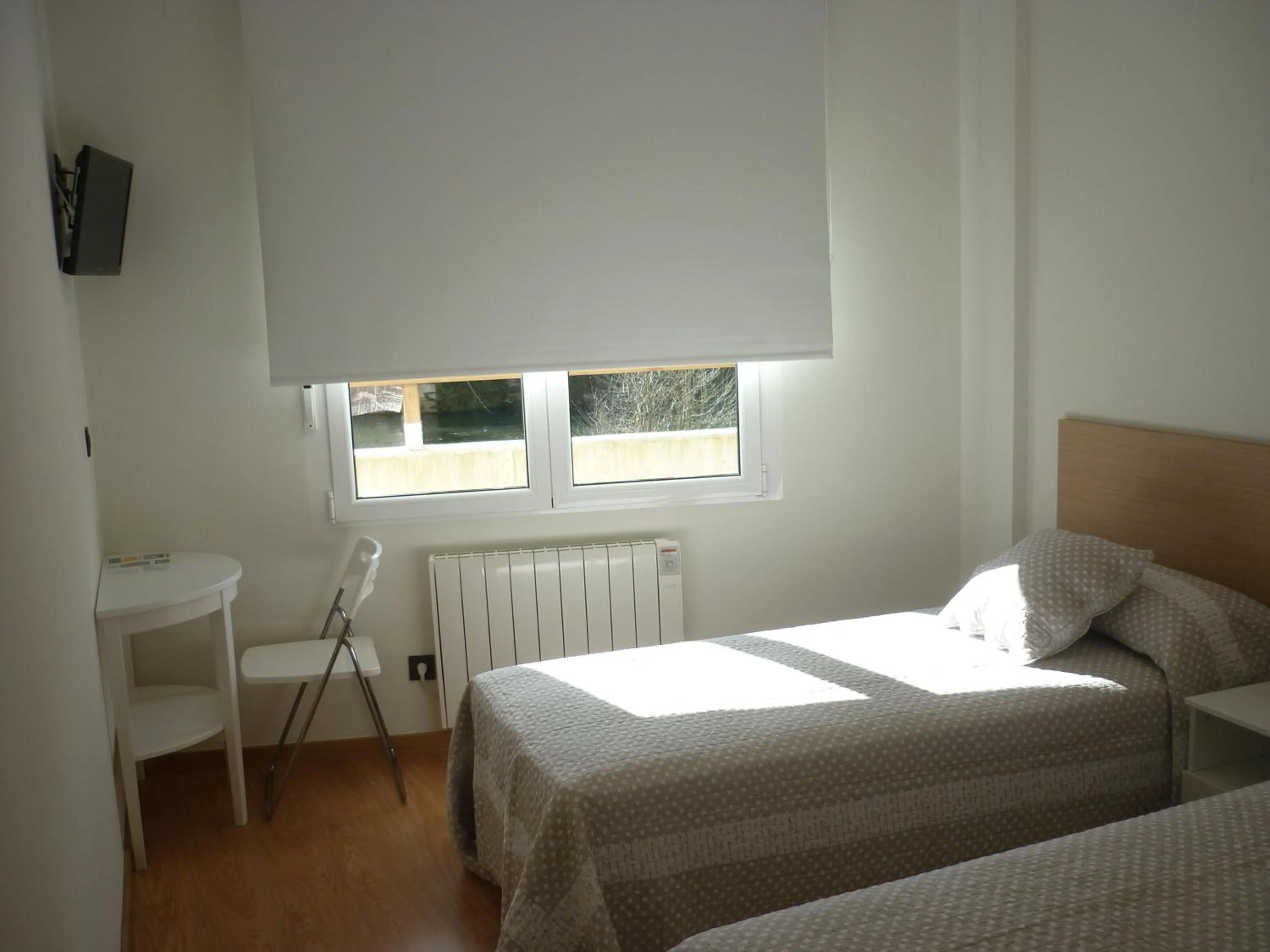 Bed in Pensión-Albergue Puente Ribeira