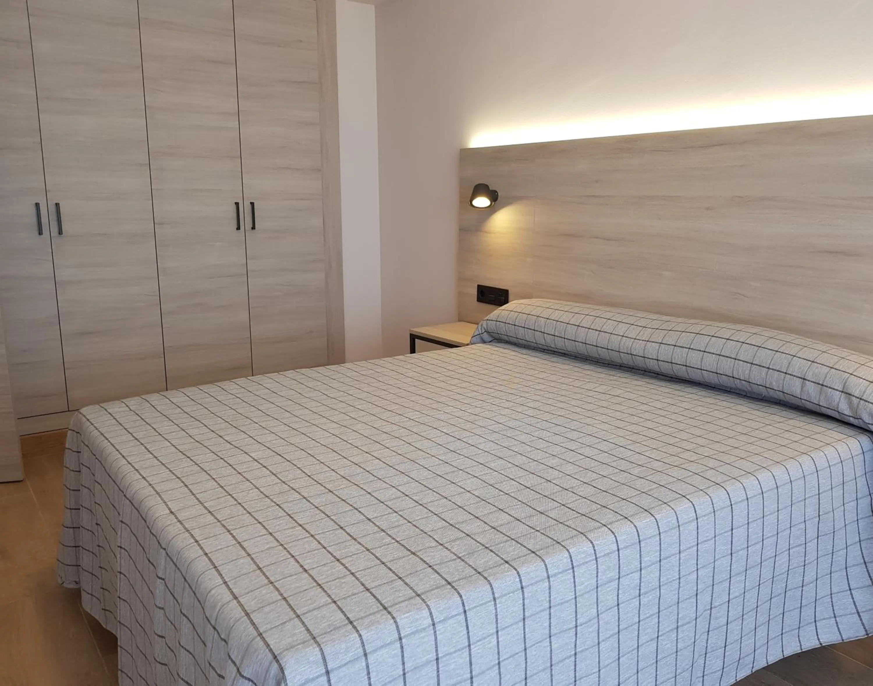 Bed in Apartamentos Odysea By Apartamentos Valentia