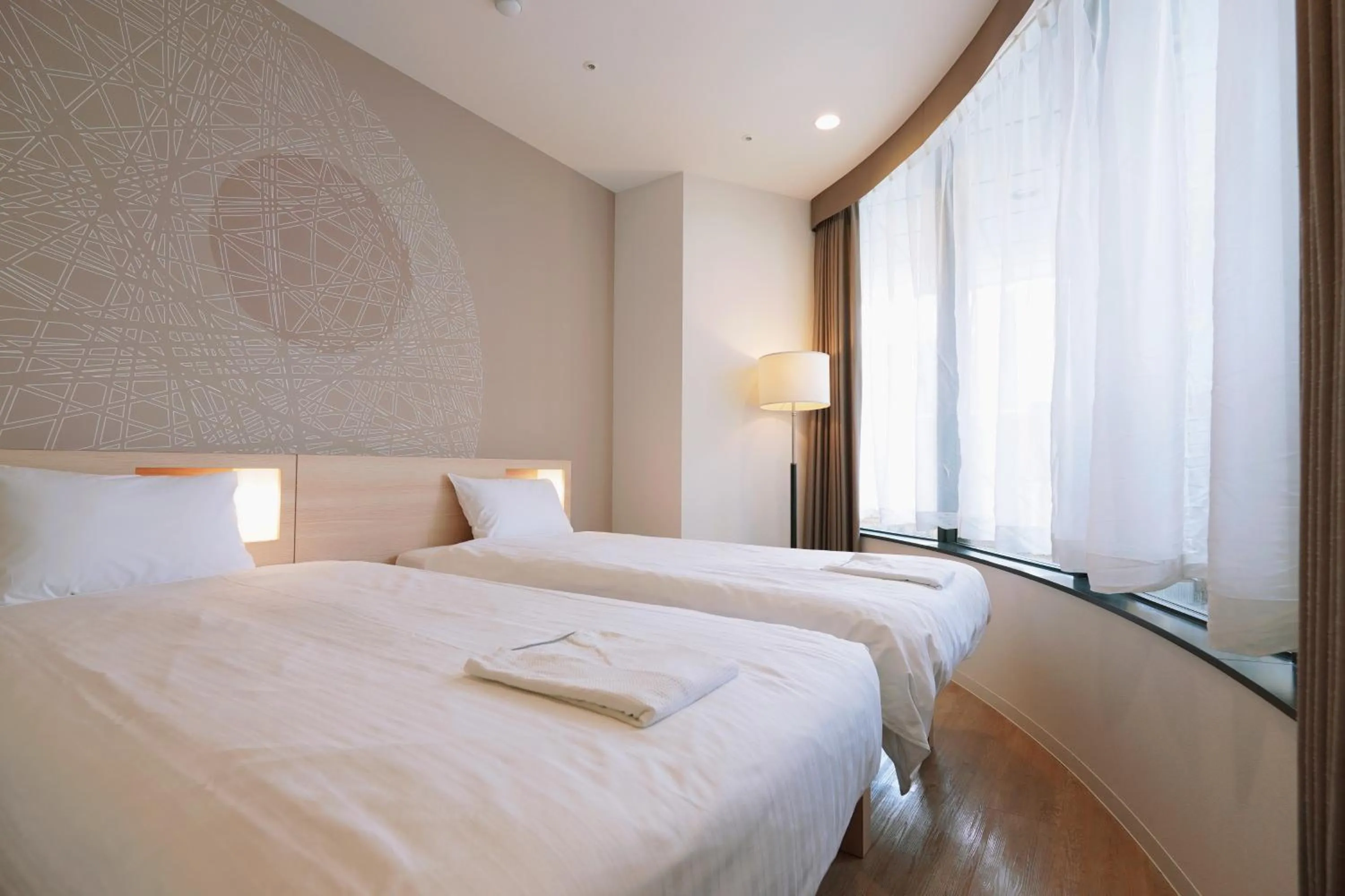 Bed in Park Central Sakura Hotel