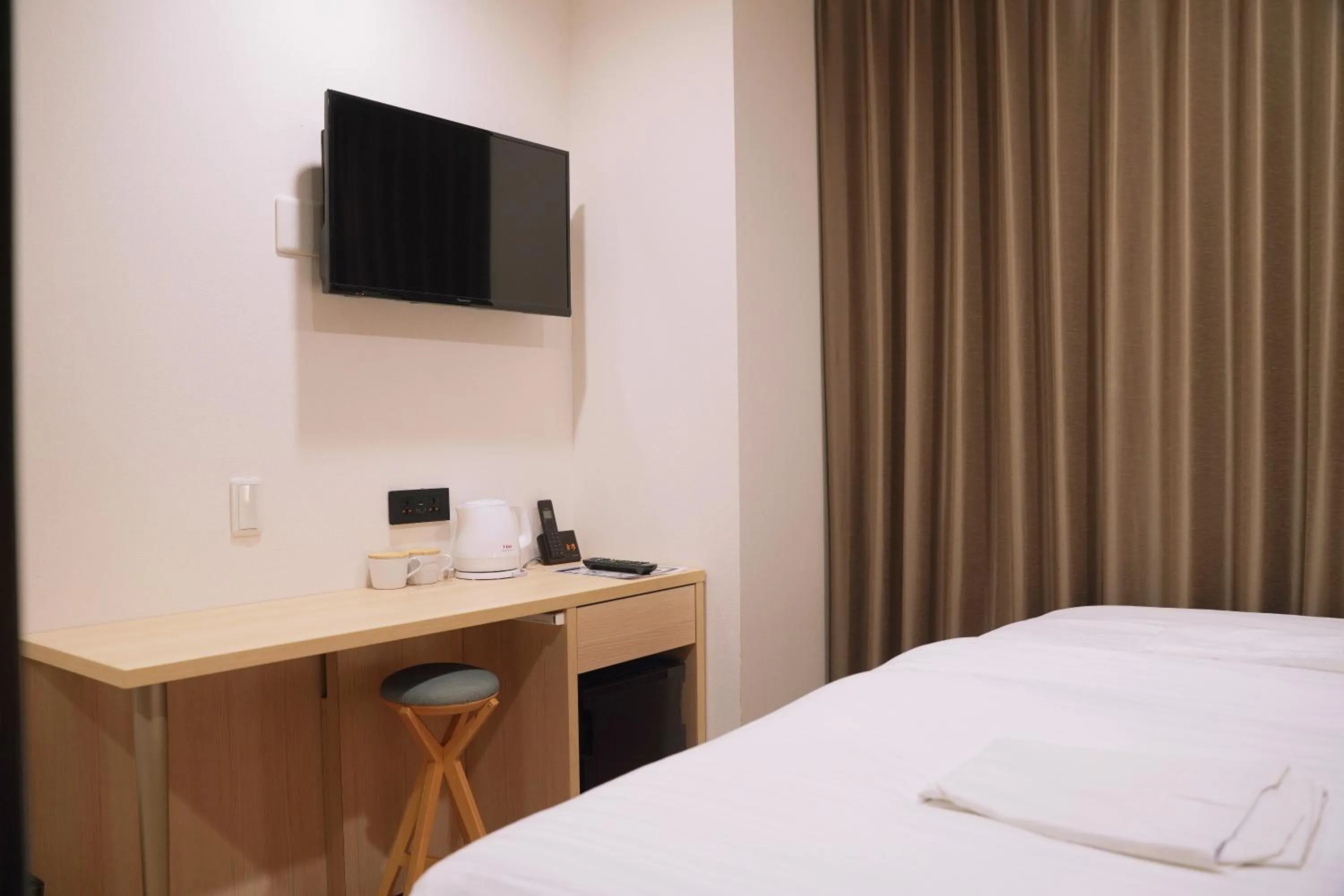 Bed in Park Central Sakura Hotel