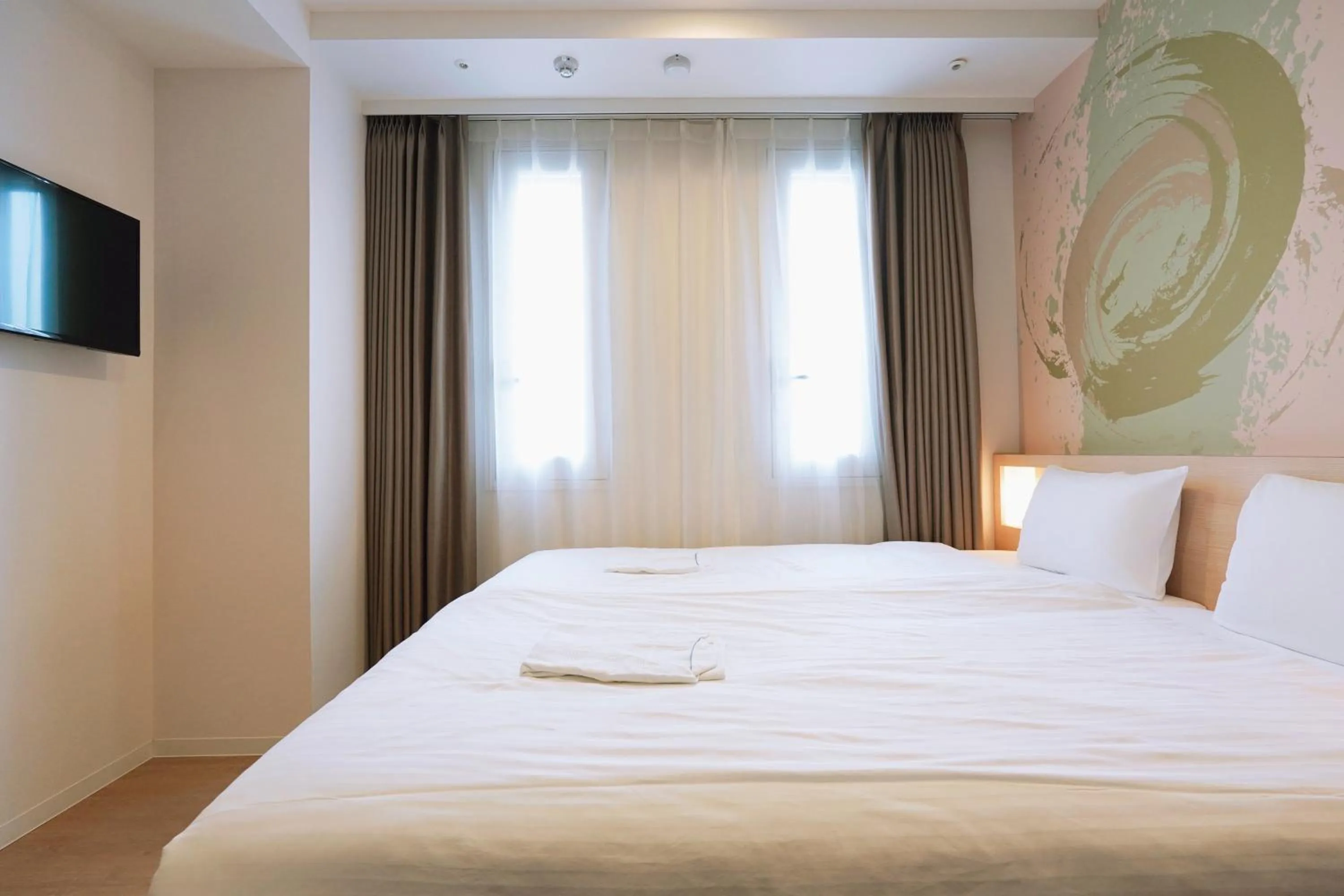 Bed in Park Central Sakura Hotel