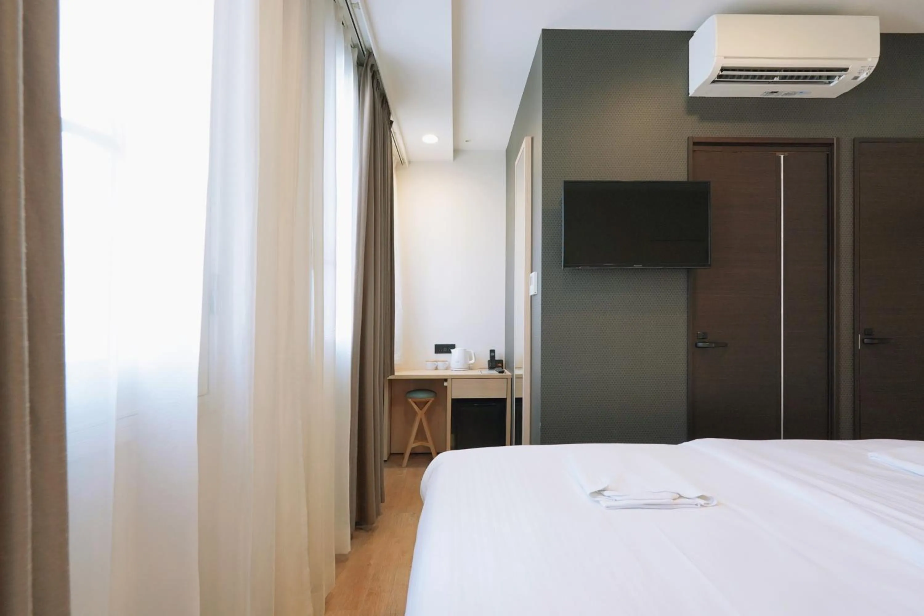 Bed in Park Central Sakura Hotel