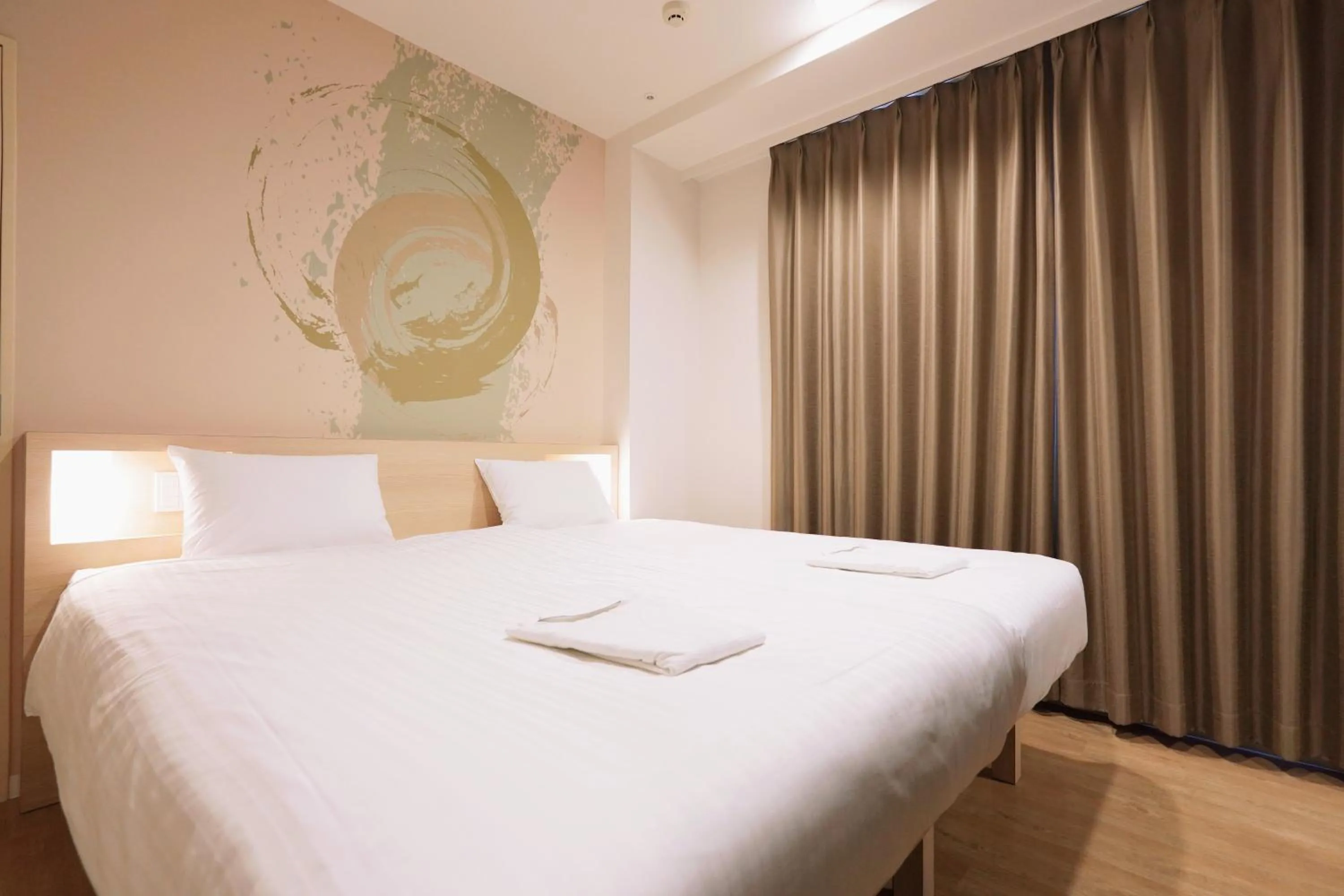 Bed in Park Central Sakura Hotel