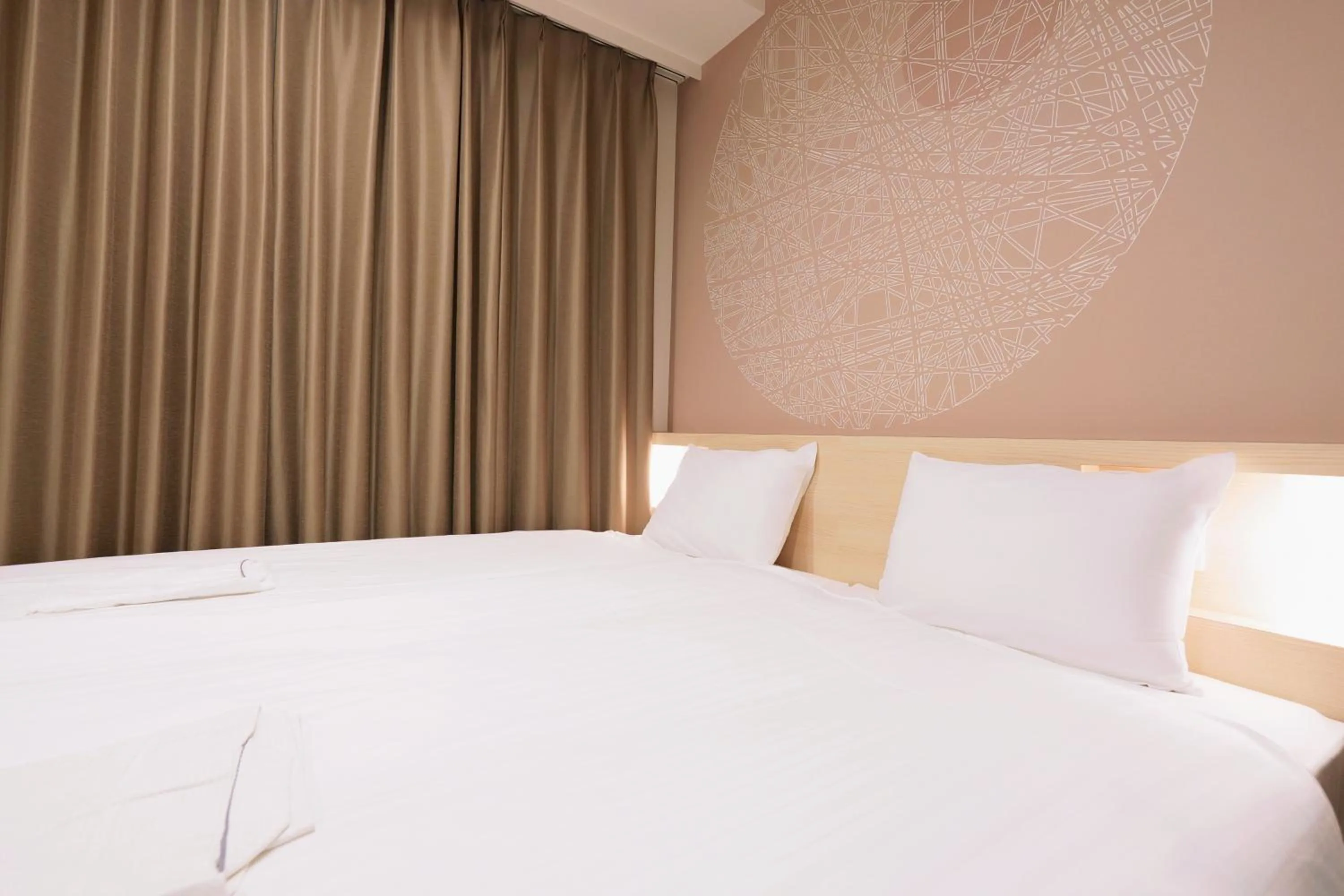 Bed in Park Central Sakura Hotel