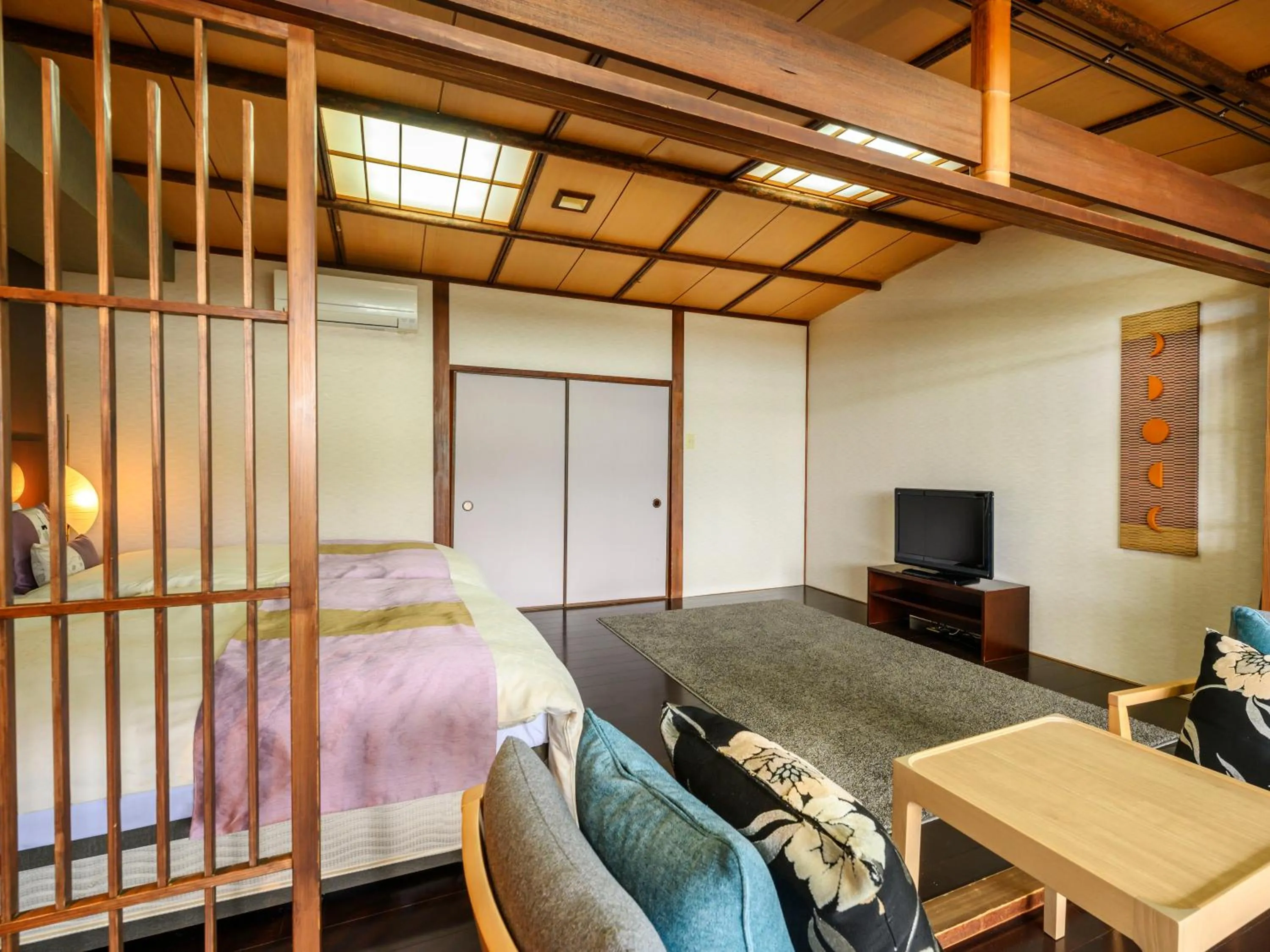 Bed in KAMENOI HOTEL Nachi Katsuura