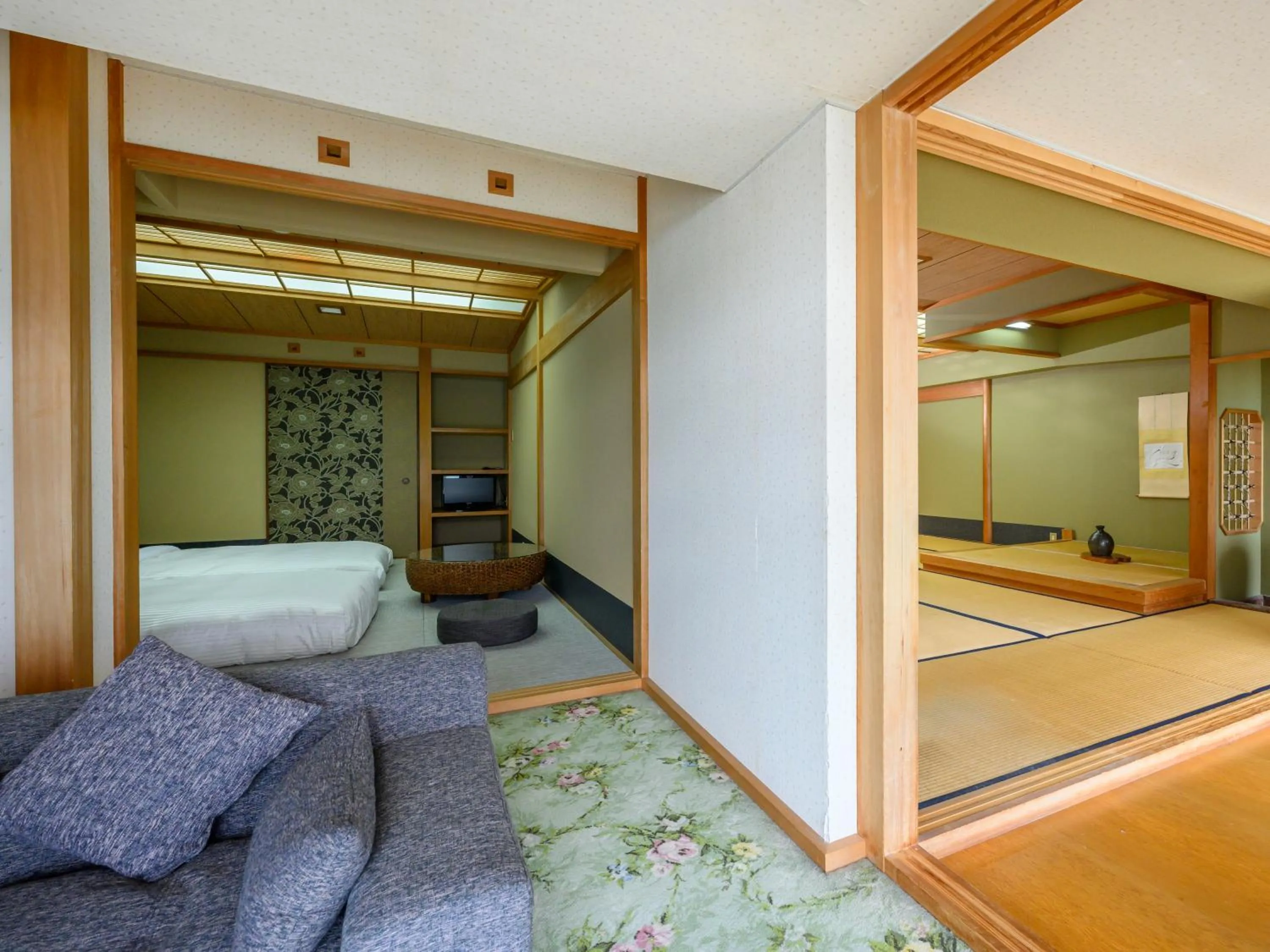 Bed in KAMENOI HOTEL Nachi Katsuura