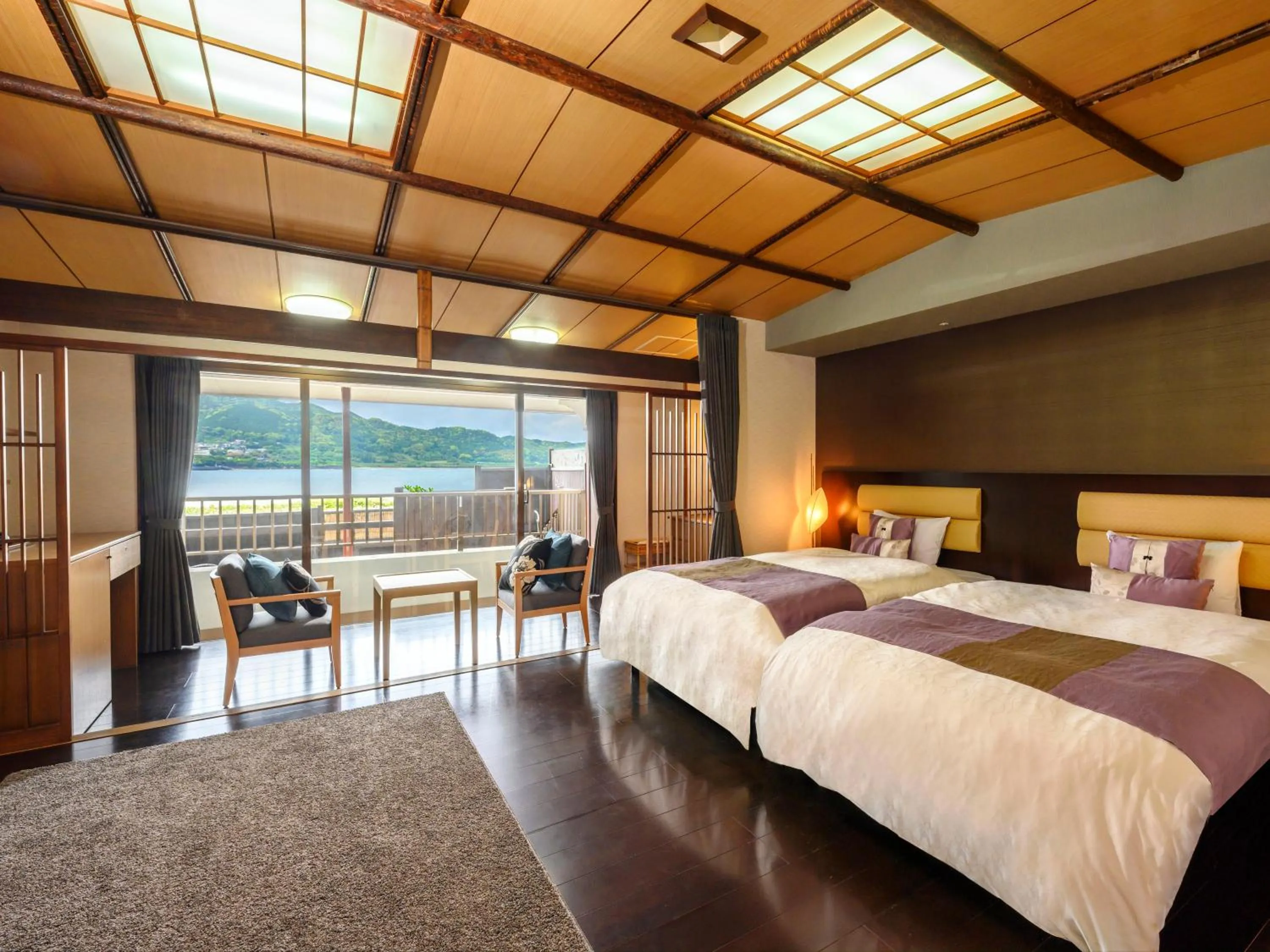 Bed in KAMENOI HOTEL Nachi Katsuura