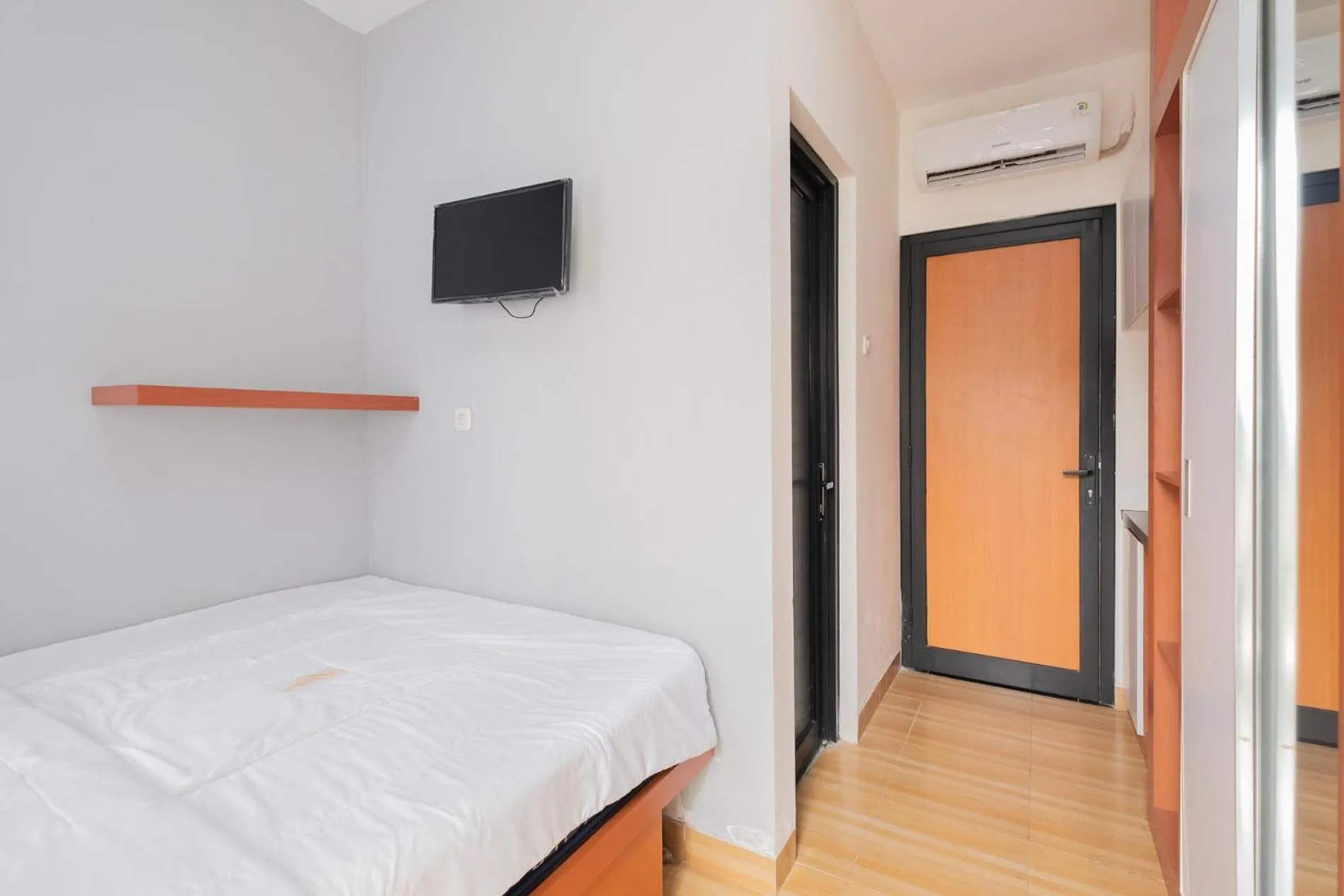 Bedroom, Bed in RedLiving Syariah Apartemen MKostel - Tower A1 Kencana Loka