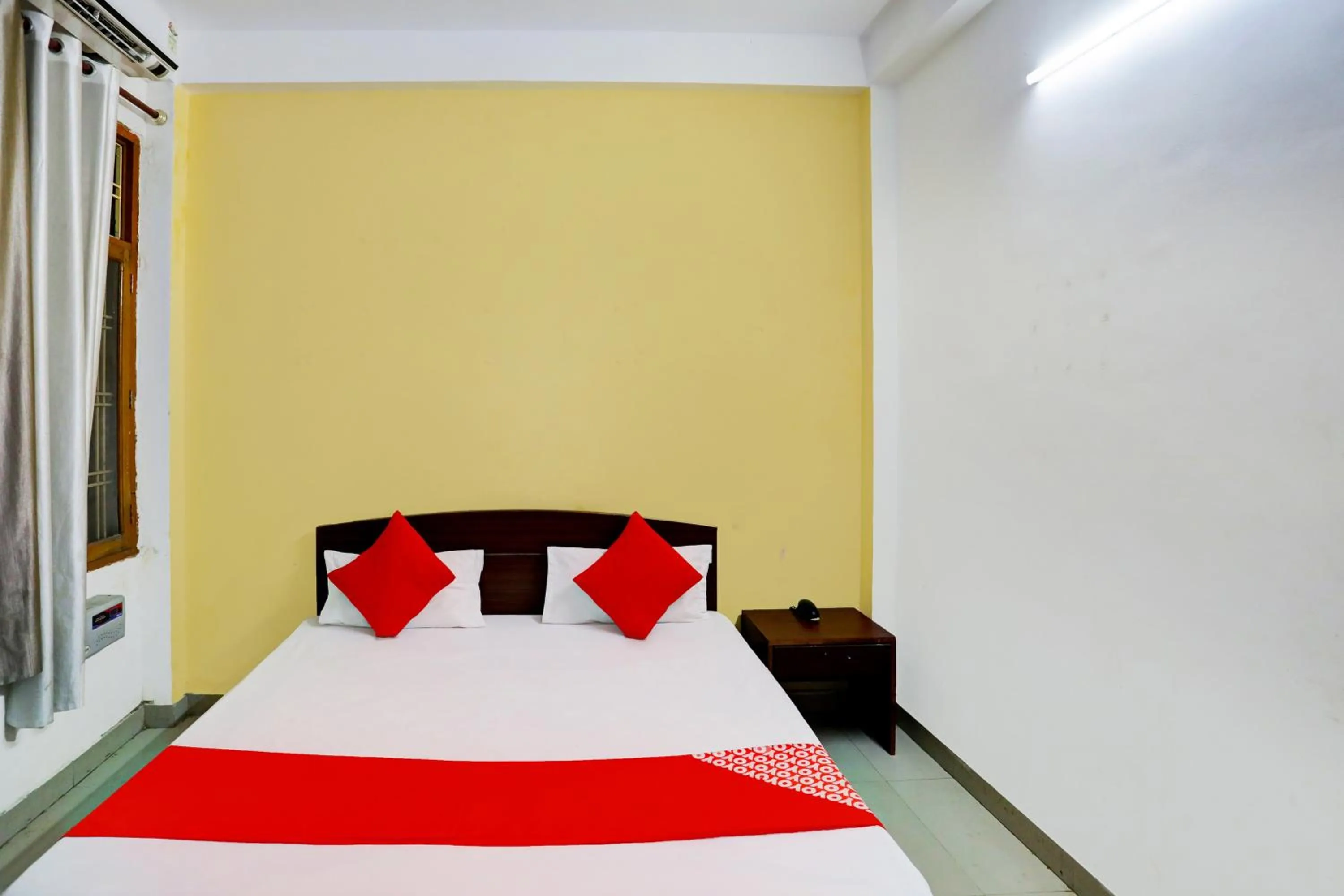 Bedroom in Hotel O Virasat Guest House