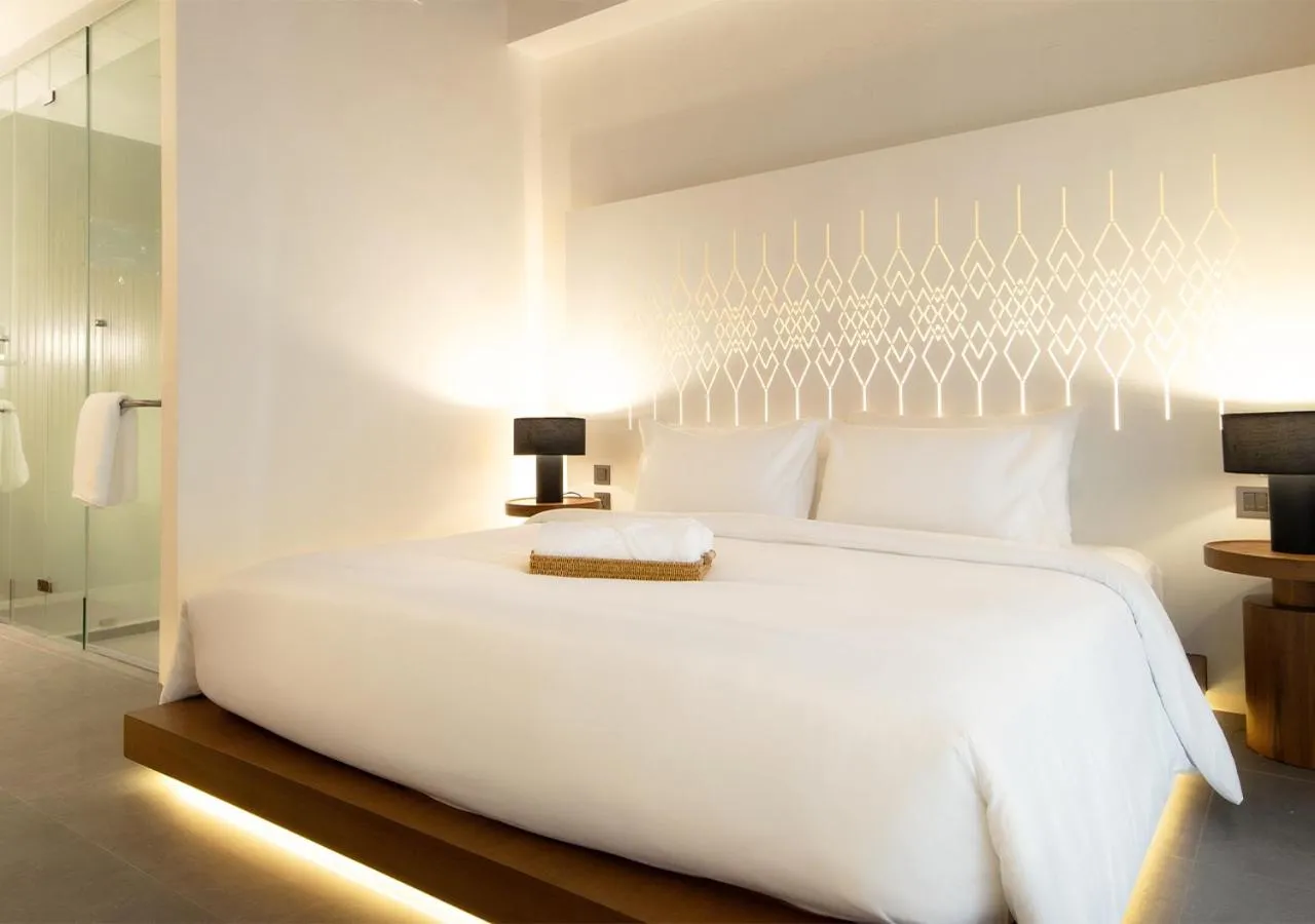 Bed in Arun Khiri Chiang Mai Hotel