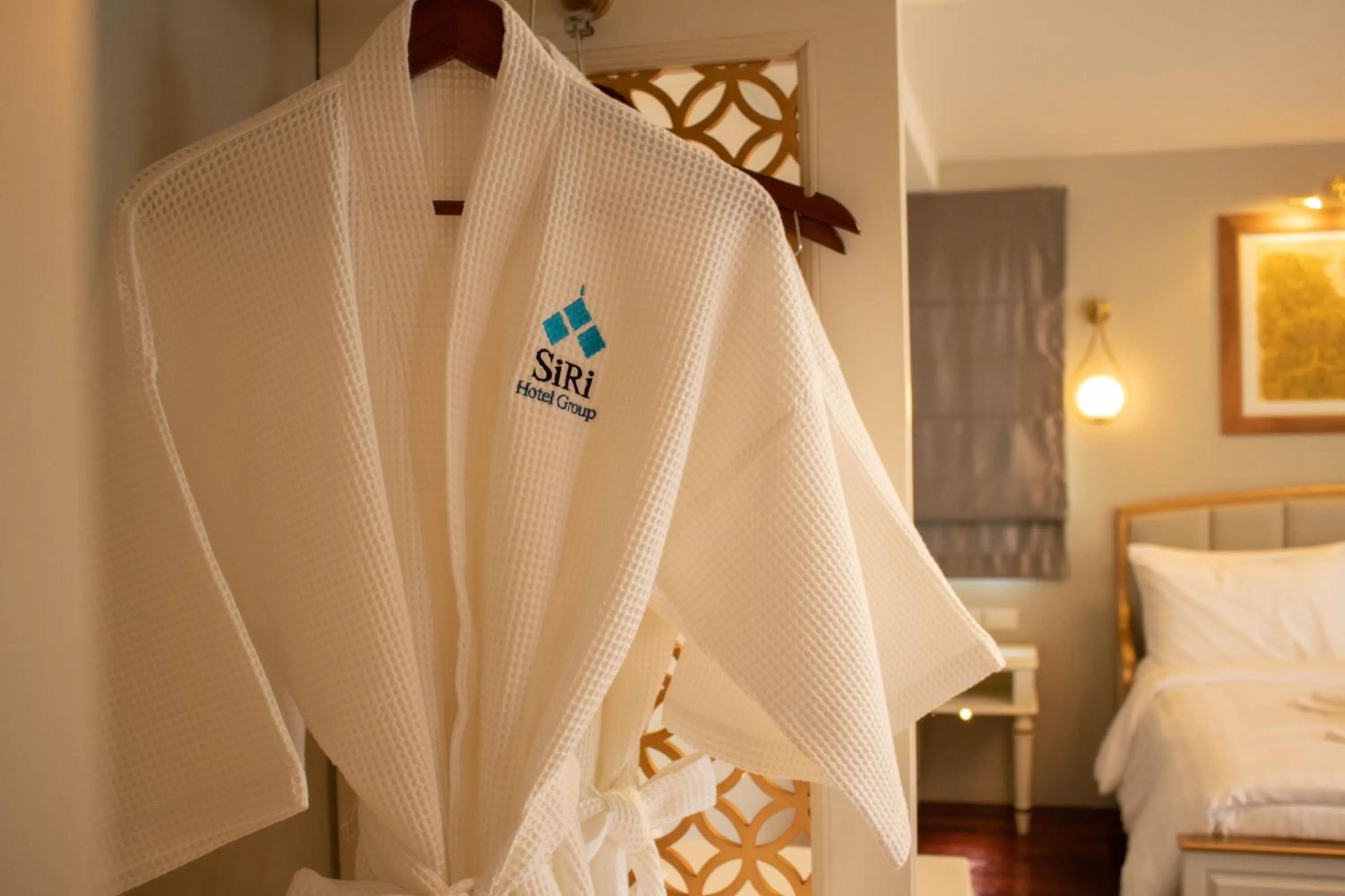 wardrobe, Bed in Siri Grand Bangkok Hotel