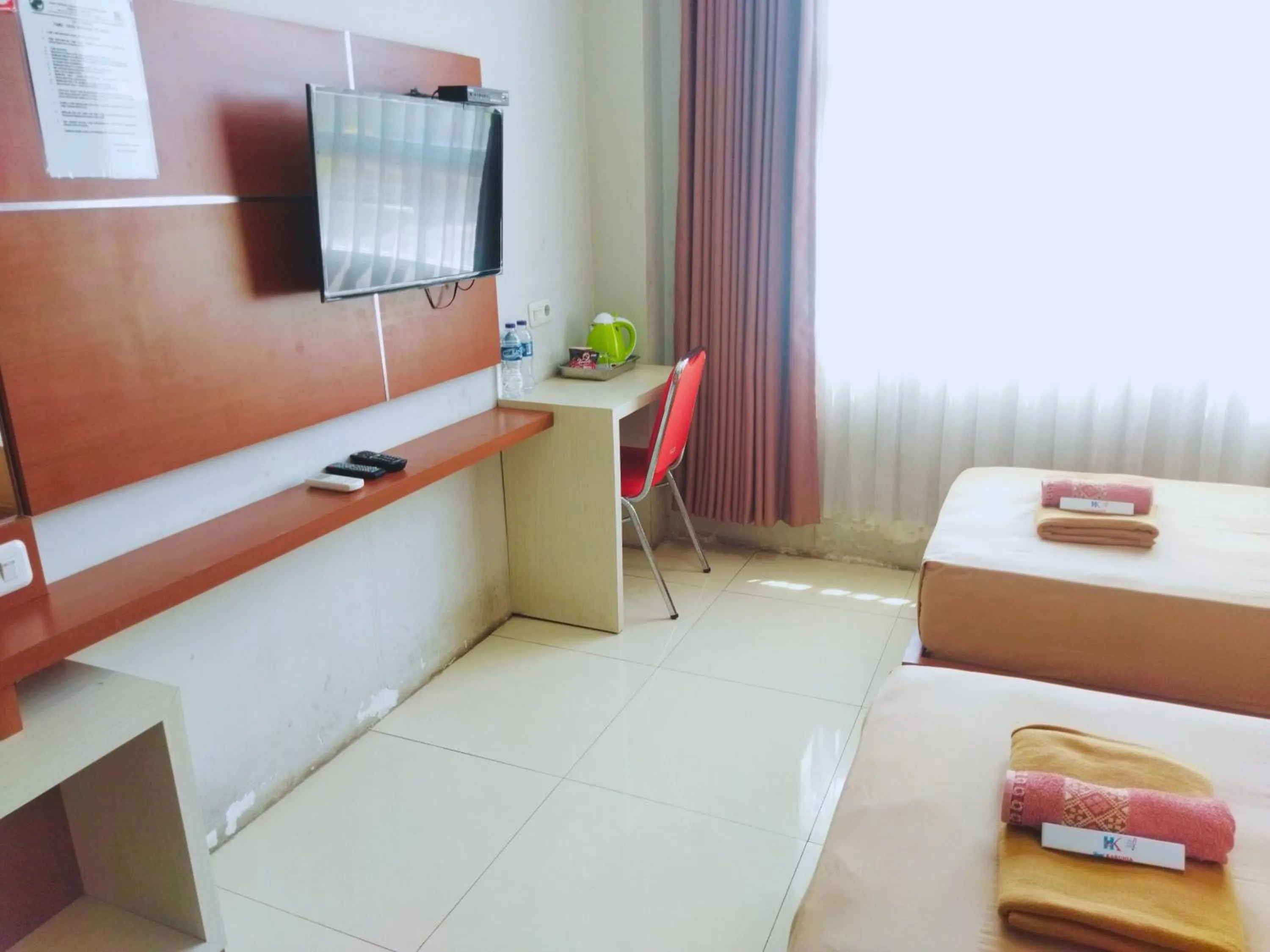 Bed in Hotel Karunia PKPRI