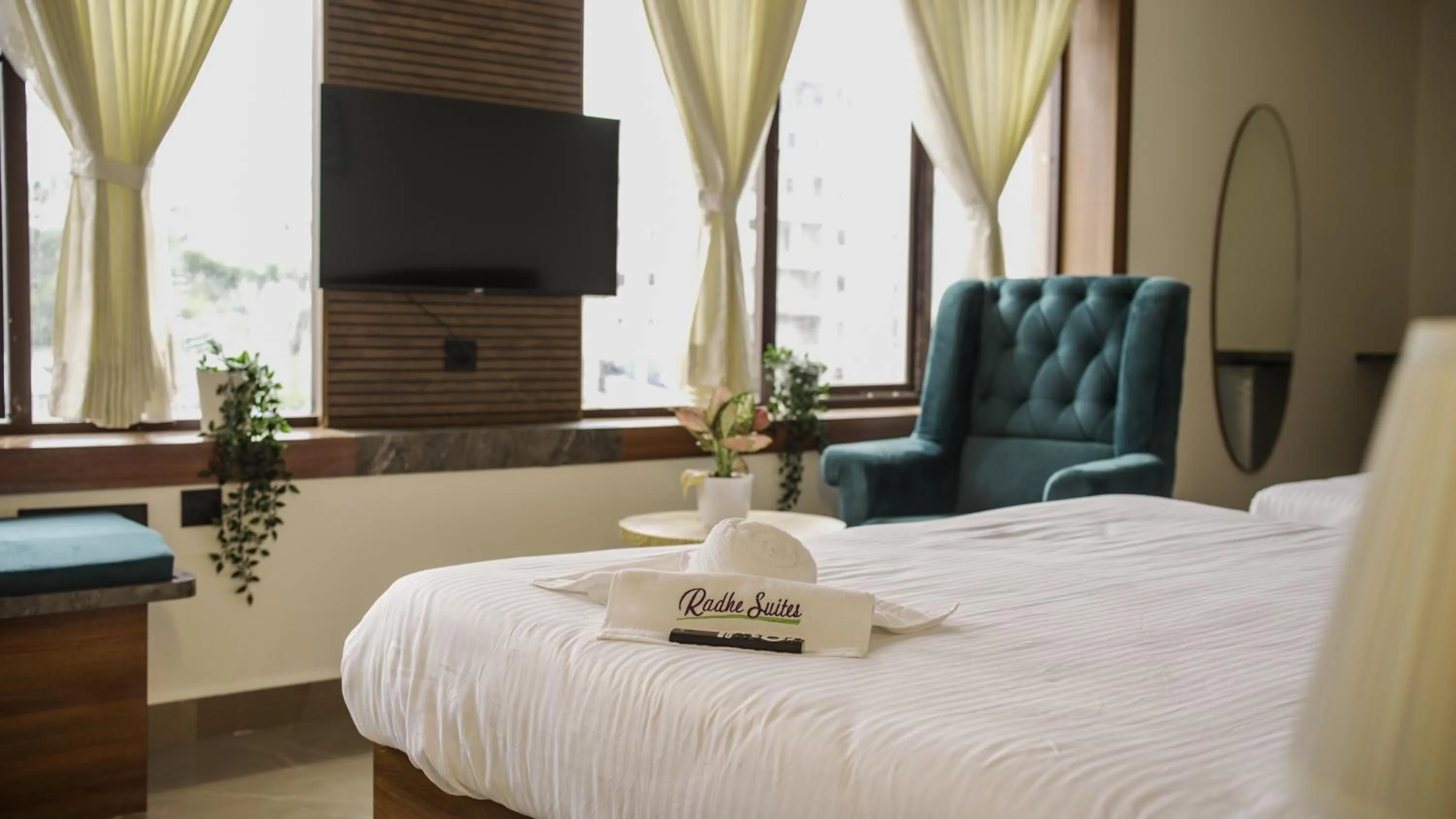 TV and multimedia, Bed in Radhe Suites