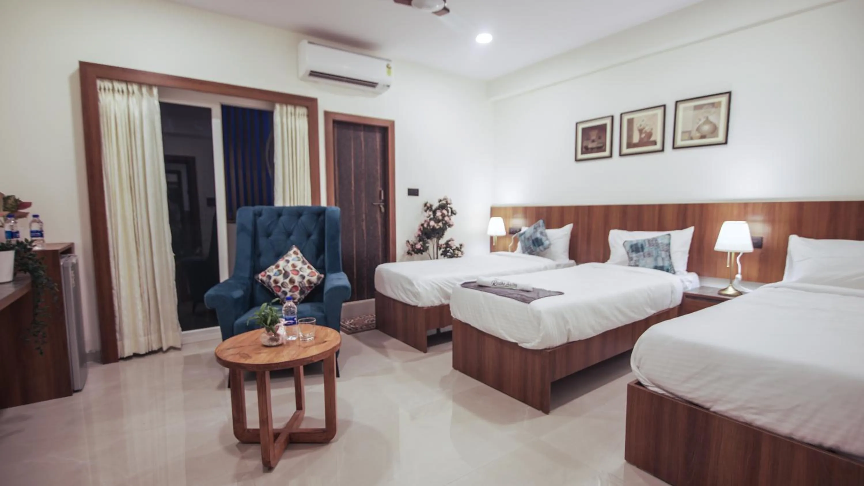 Bed in Radhe Suites