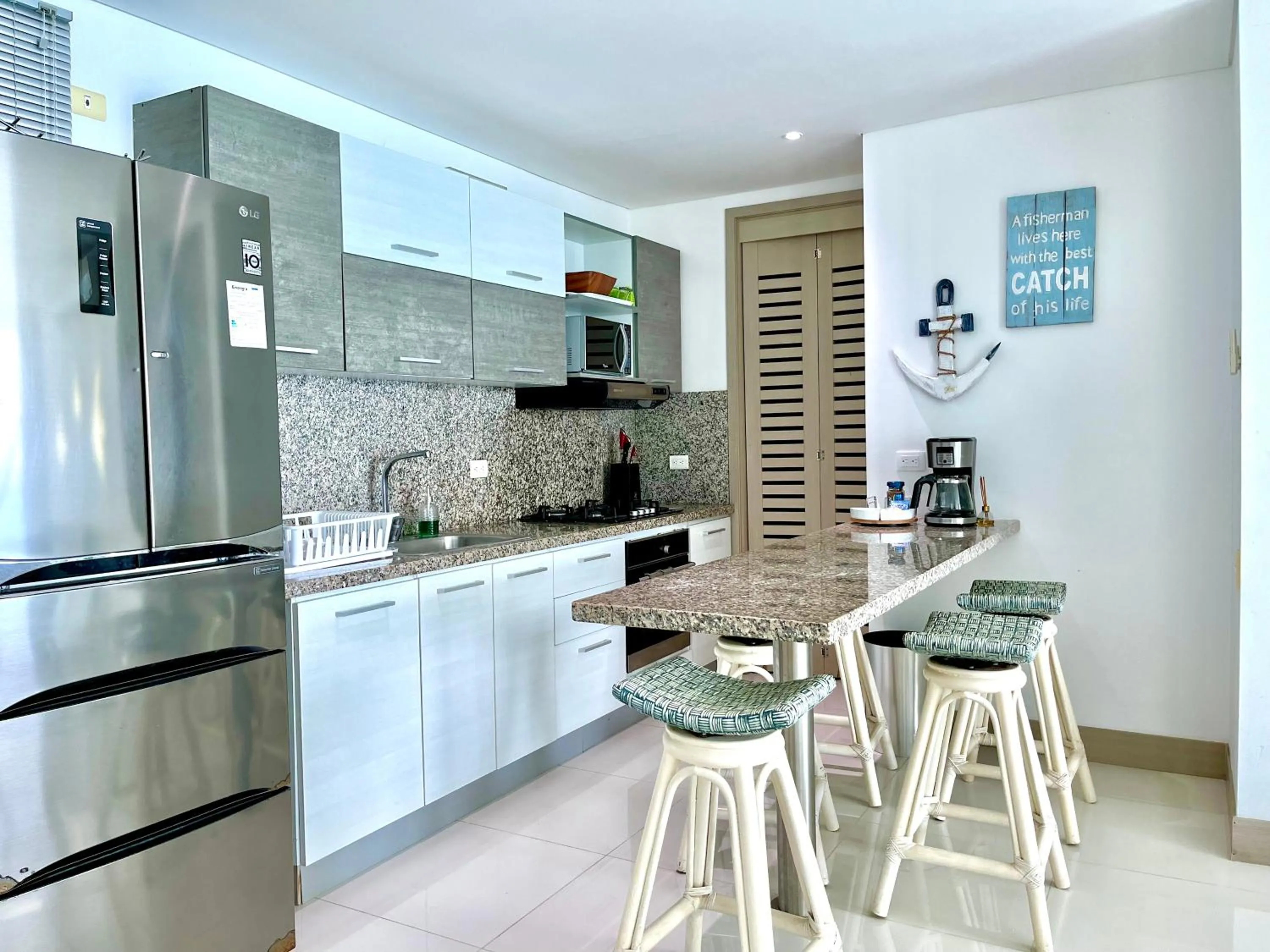 Kitchen or kitchenette in by Calamari Homes - Palmetto Beach 2504 Bocagrande