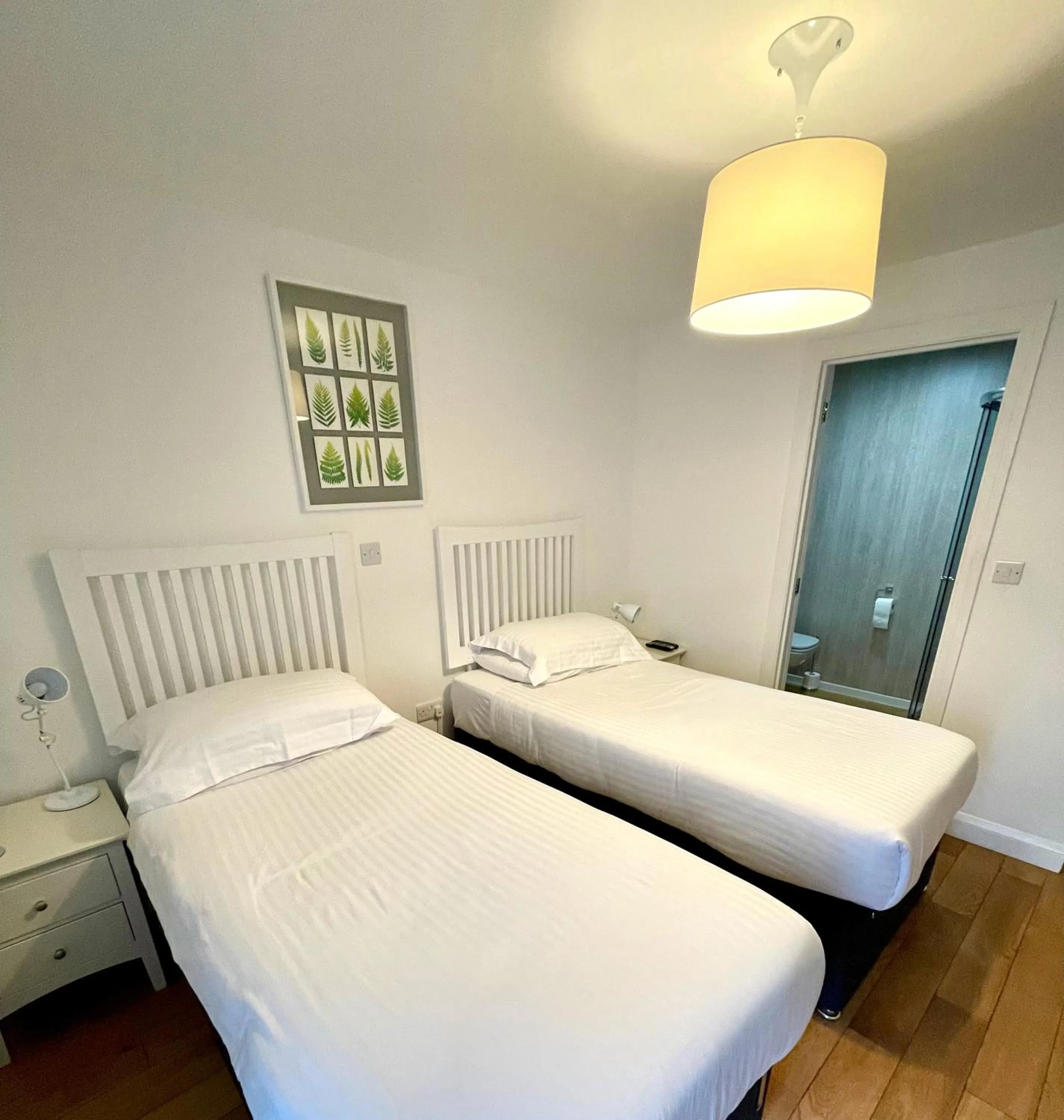 Bed in The Queen's Head Hotel