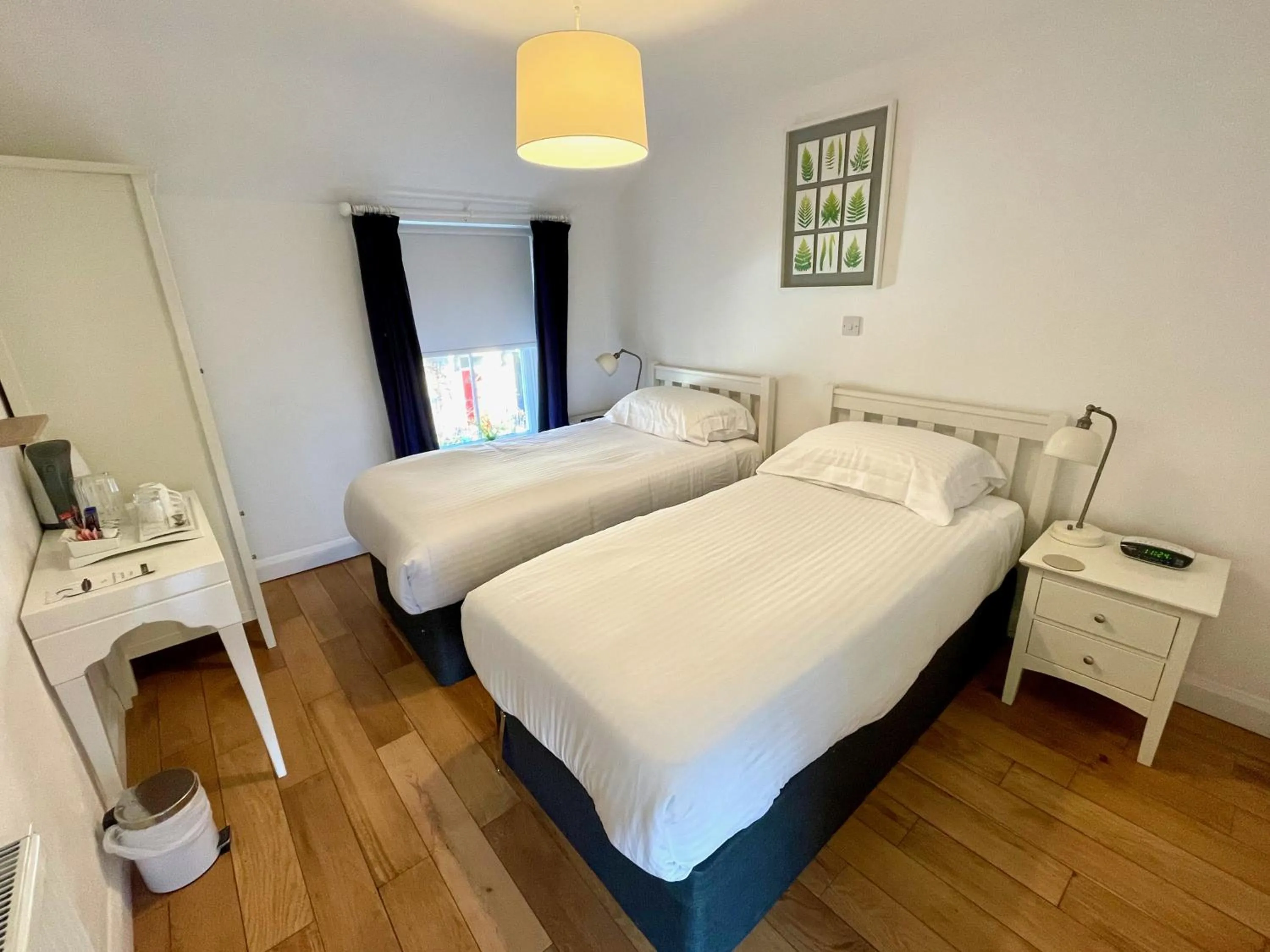 Bed in The Queen's Head Hotel