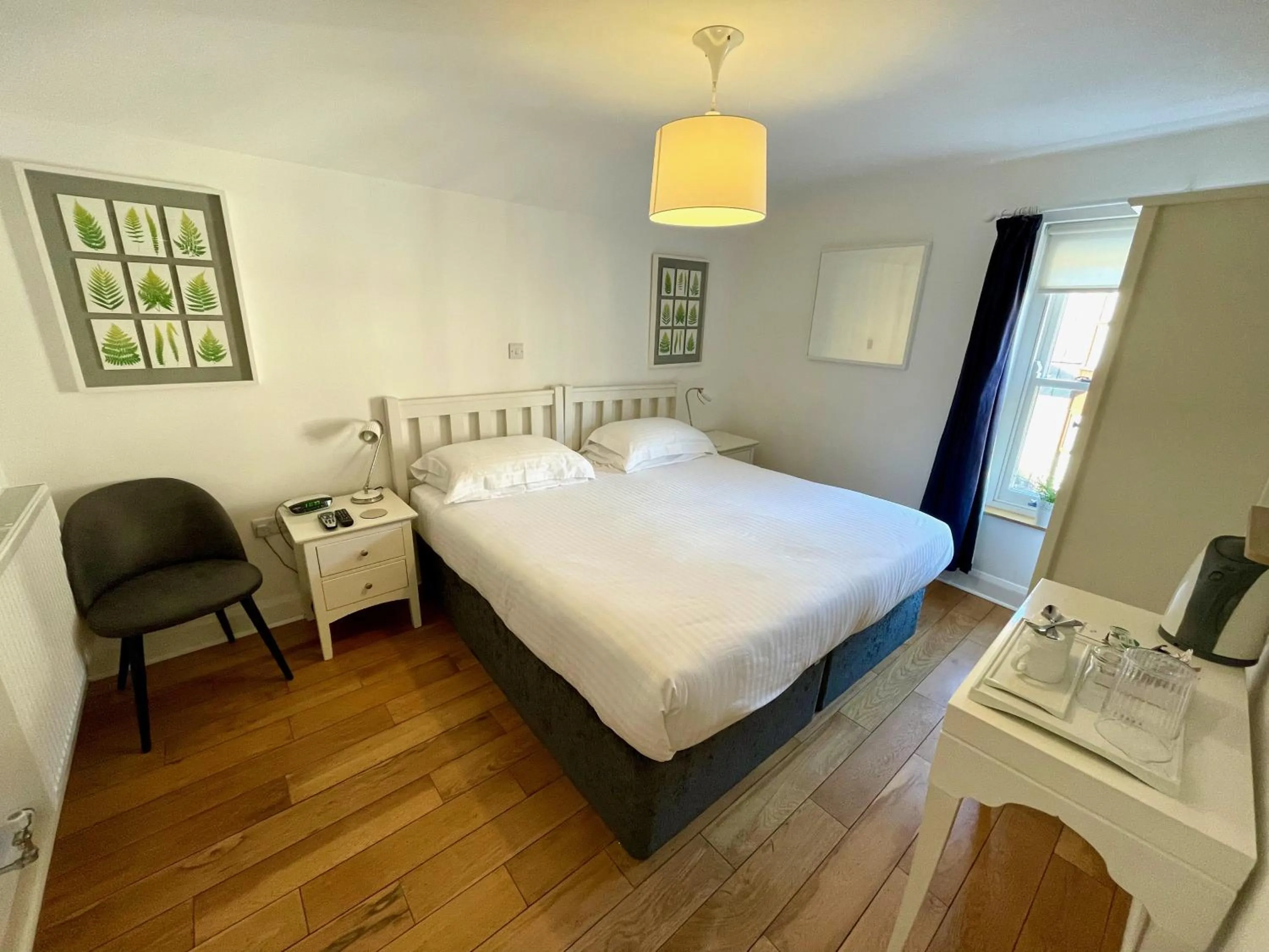 Bed in The Queen's Head Hotel