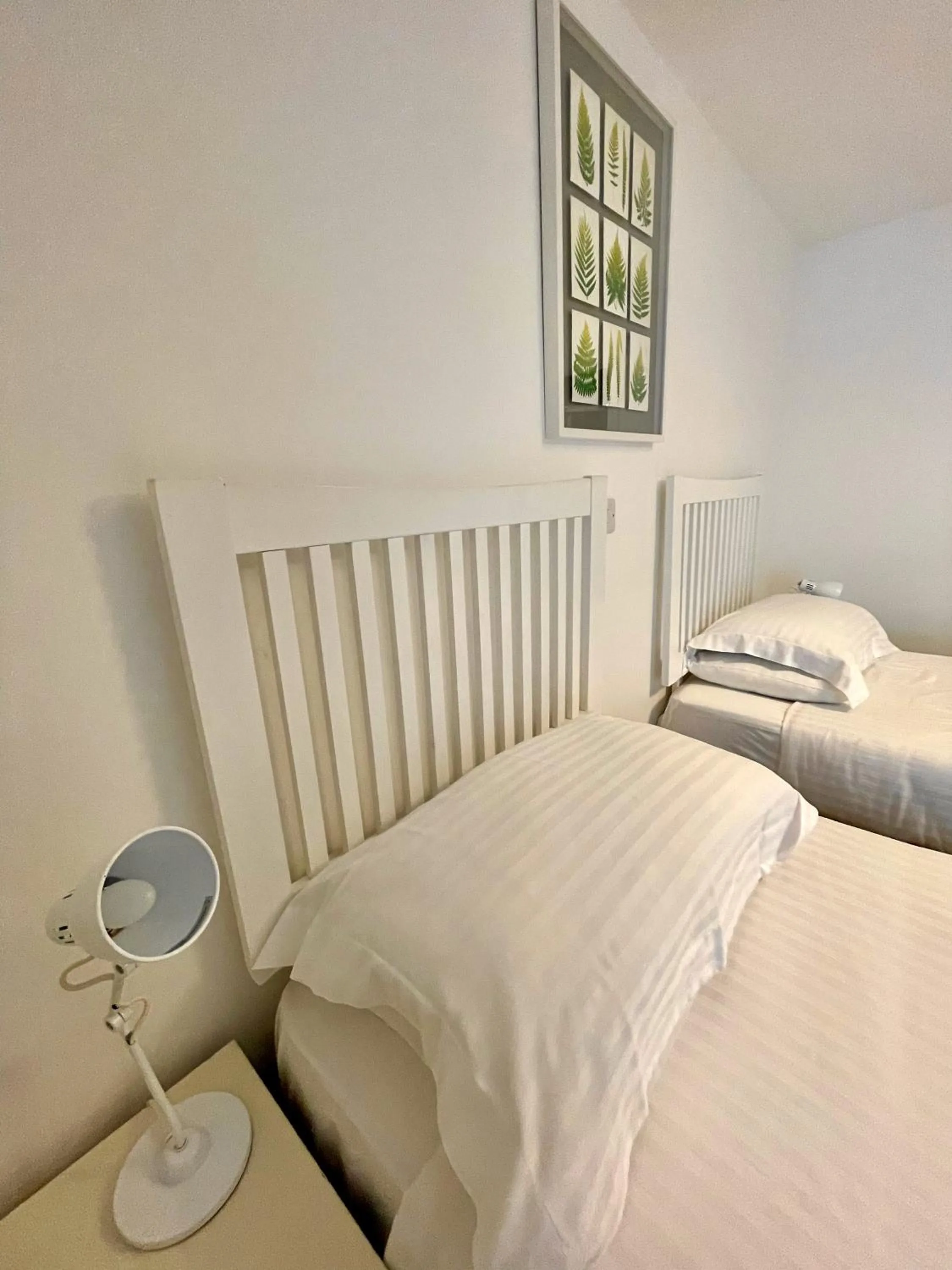 Bed in The Queen's Head Hotel